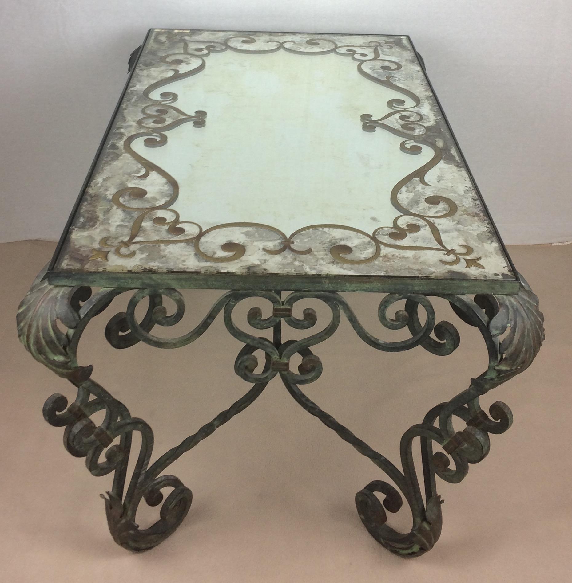 20th Century Wrought Iron Coffee Table with Églomisé Mirror Attributed to Gilbert Pollierat