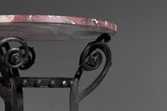 Wrought iron column stand with art nouveau foliage decoration