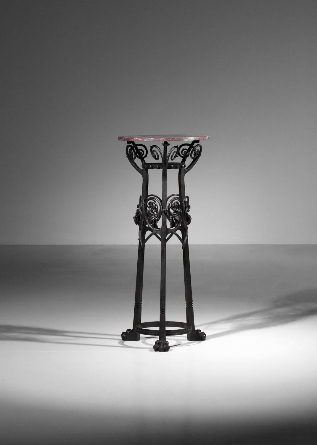 Stone Wrought iron column stand with art nouveau foliage decoration For Sale