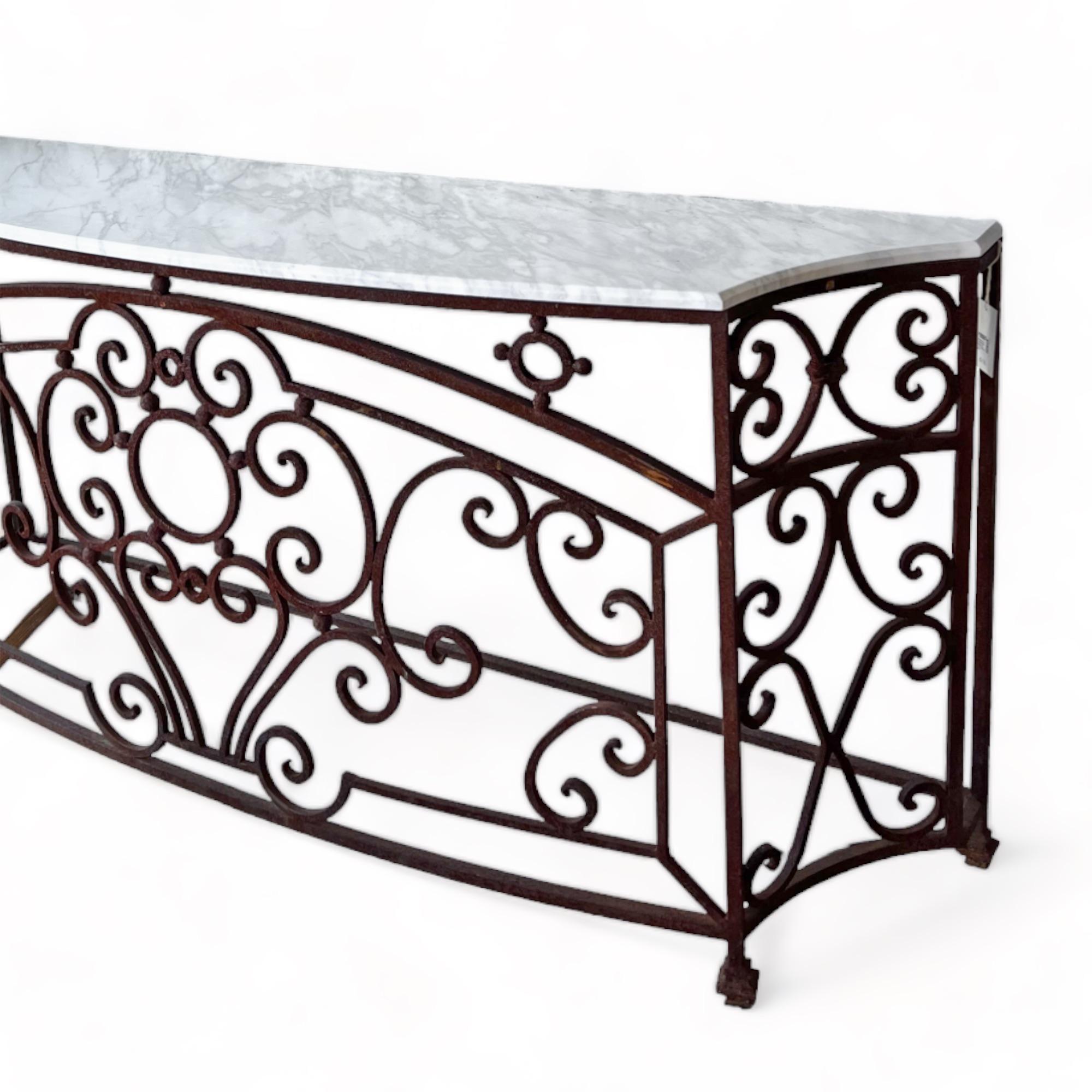 The intricate scrollwork and delicate detailing showcase the timeless beauty of French design. The spacious tabletop provides an ideal surface for displaying decor and its slender profile makes a versatile addition to entryways or foyers.

Measures: