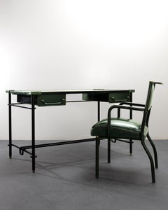 Wrought iron desk with its matching chair by Jacques Adnet