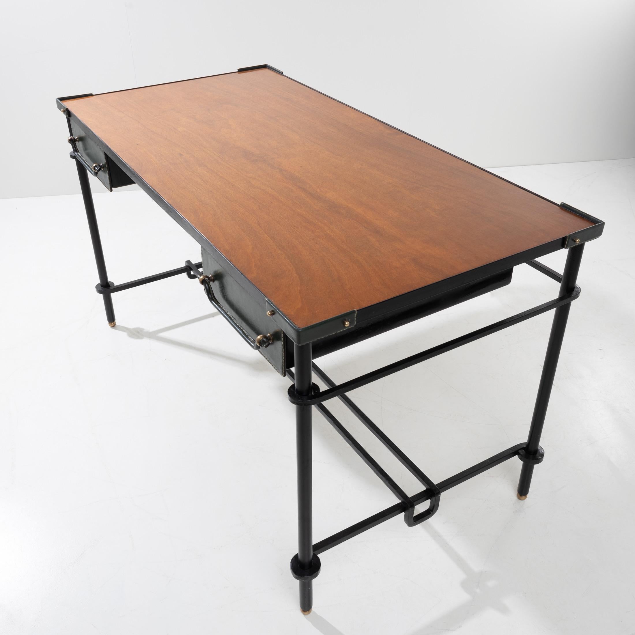Very nice desk in black patinated wrought iron.
The 4 feet supporting the belt of the upper plate also in steel.
They are joined by a spacer in the lower part 