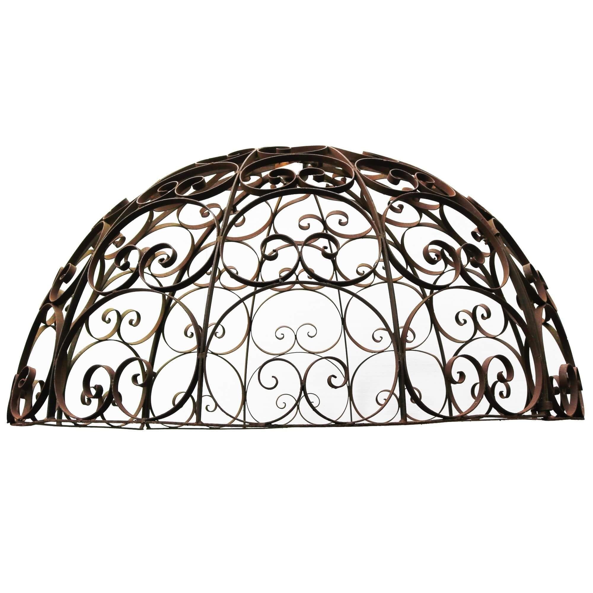 Made at the hand a talented blacksmith during the 1930s, this wrought iron dome is an ornate feature for the garden or courtyard of an idyllic and finely landscaped country estate. It could be placed atop a stone or wrought iron gazebo as a focal