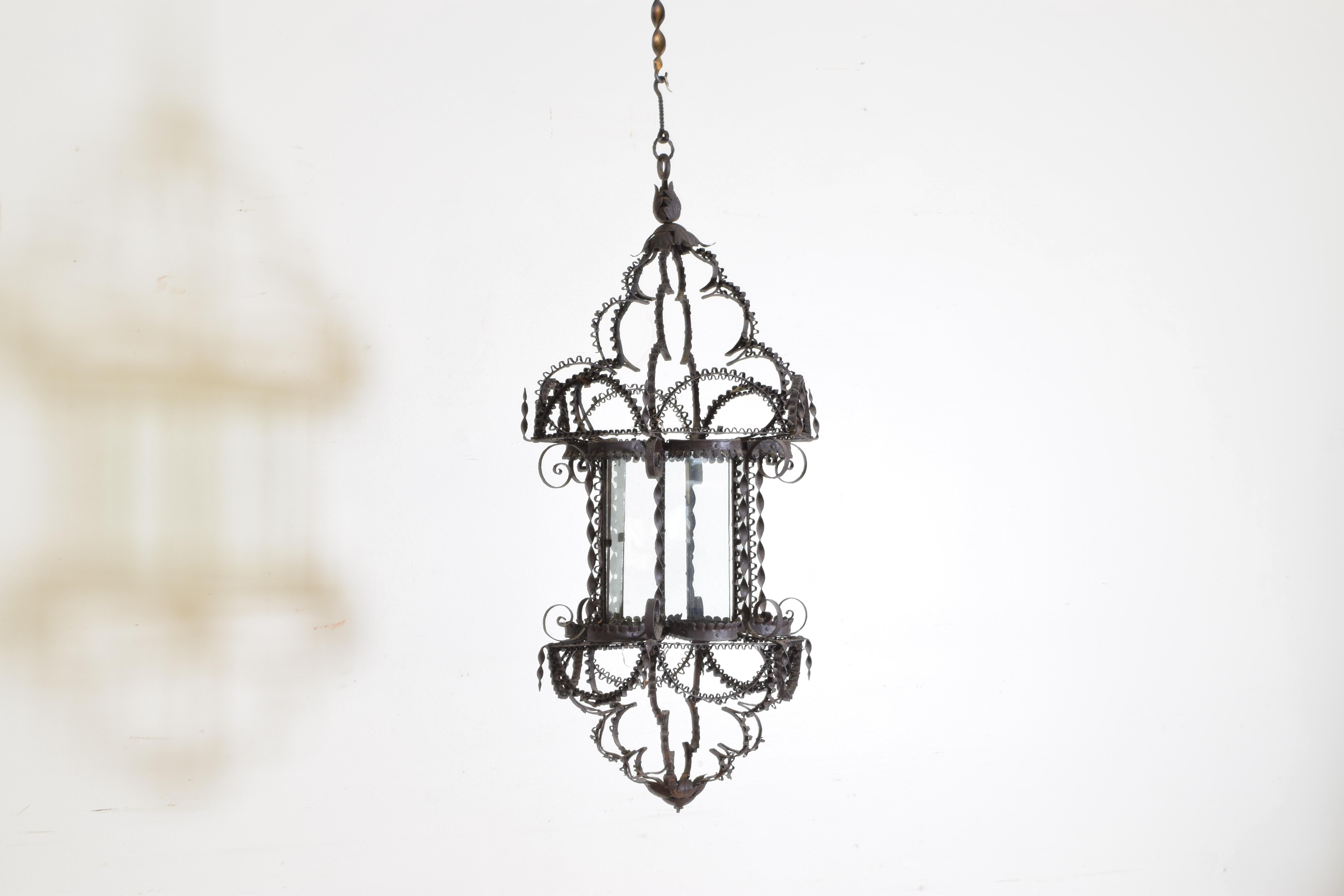 Italian Wrought Iron Filigree Baroque Style Hanging Glass Paned Lantern, 19th century