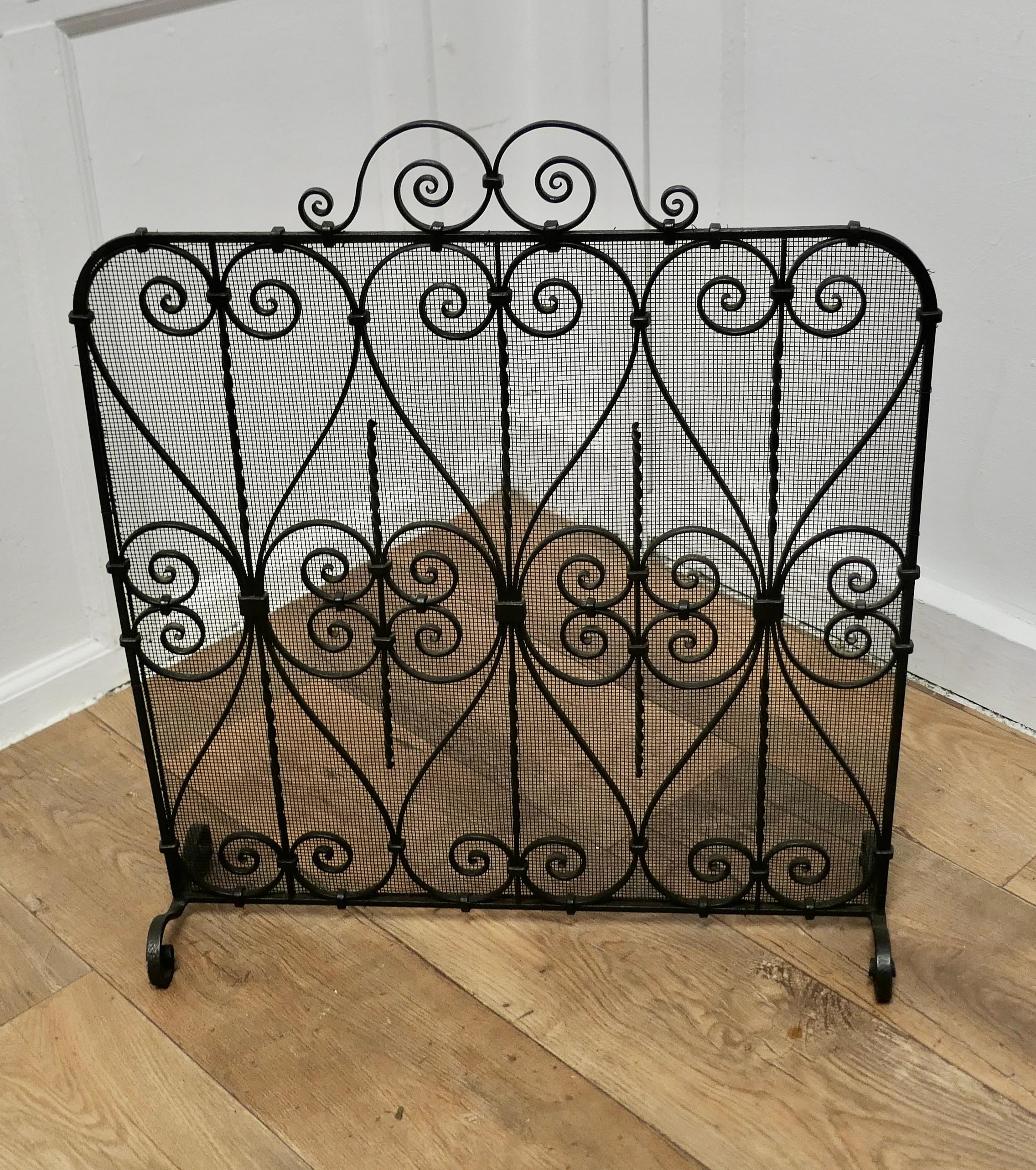 Wrought Iron Fire Screen

This is an intricate and very attractive piece, the wrought iron work is superbly executed with a fine mesh infill
In good sound, condition and a very attractive addition to any Fire Place
The screen, is 24” wide, 28” tall