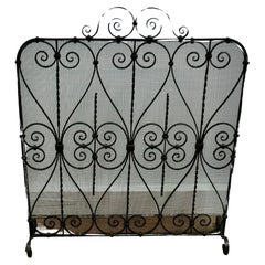 Wrought Iron Fire Screen  This is an intricate and very attractive piece, the wr