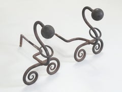 Wrought Iron Fireplace Andirons. Modernist Curled Form with Sphere Top c1940's