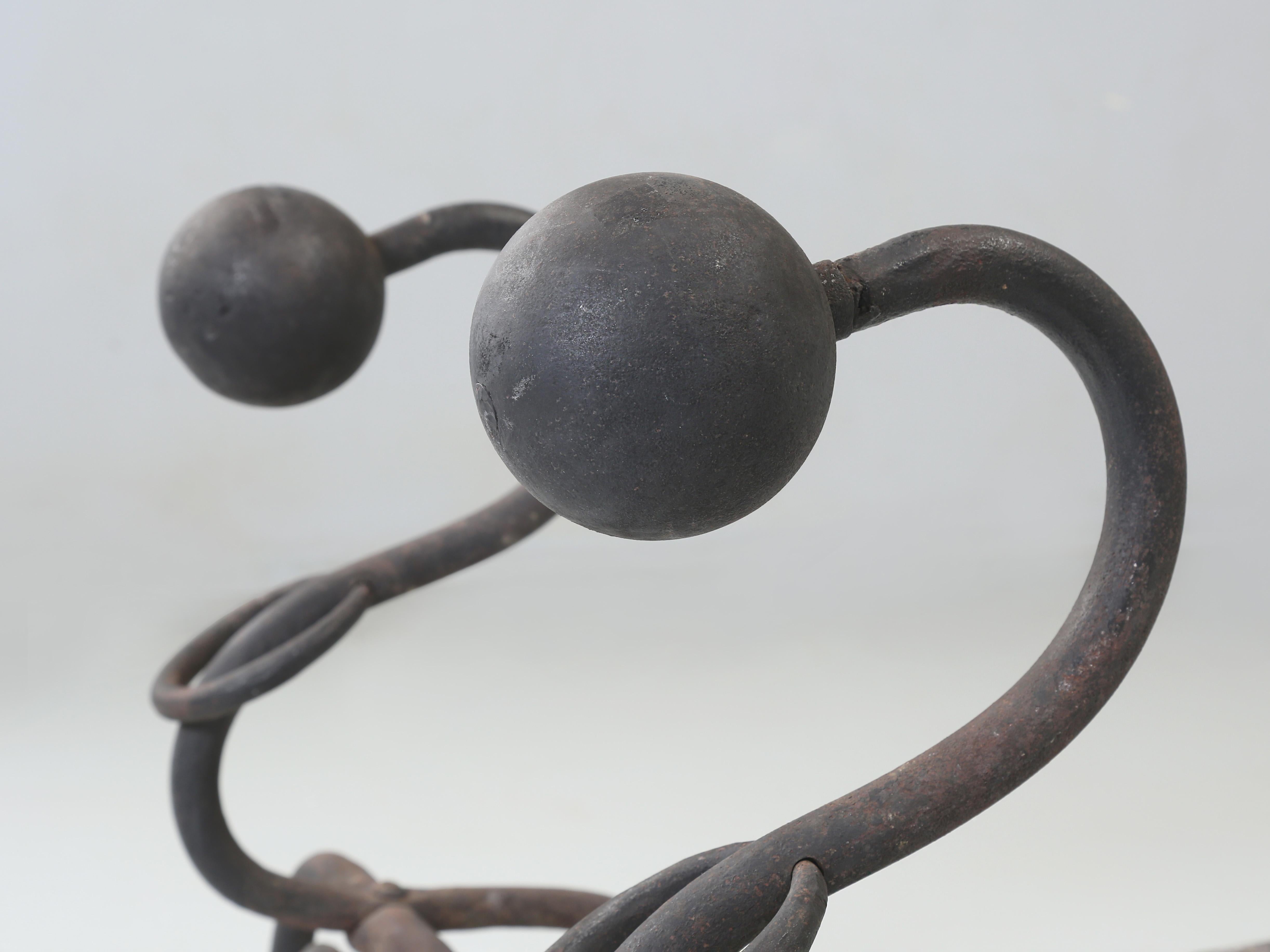 French Wrought Iron Fireplace Andirons. Modernist Curled Form with Sphere Top c1940's For Sale