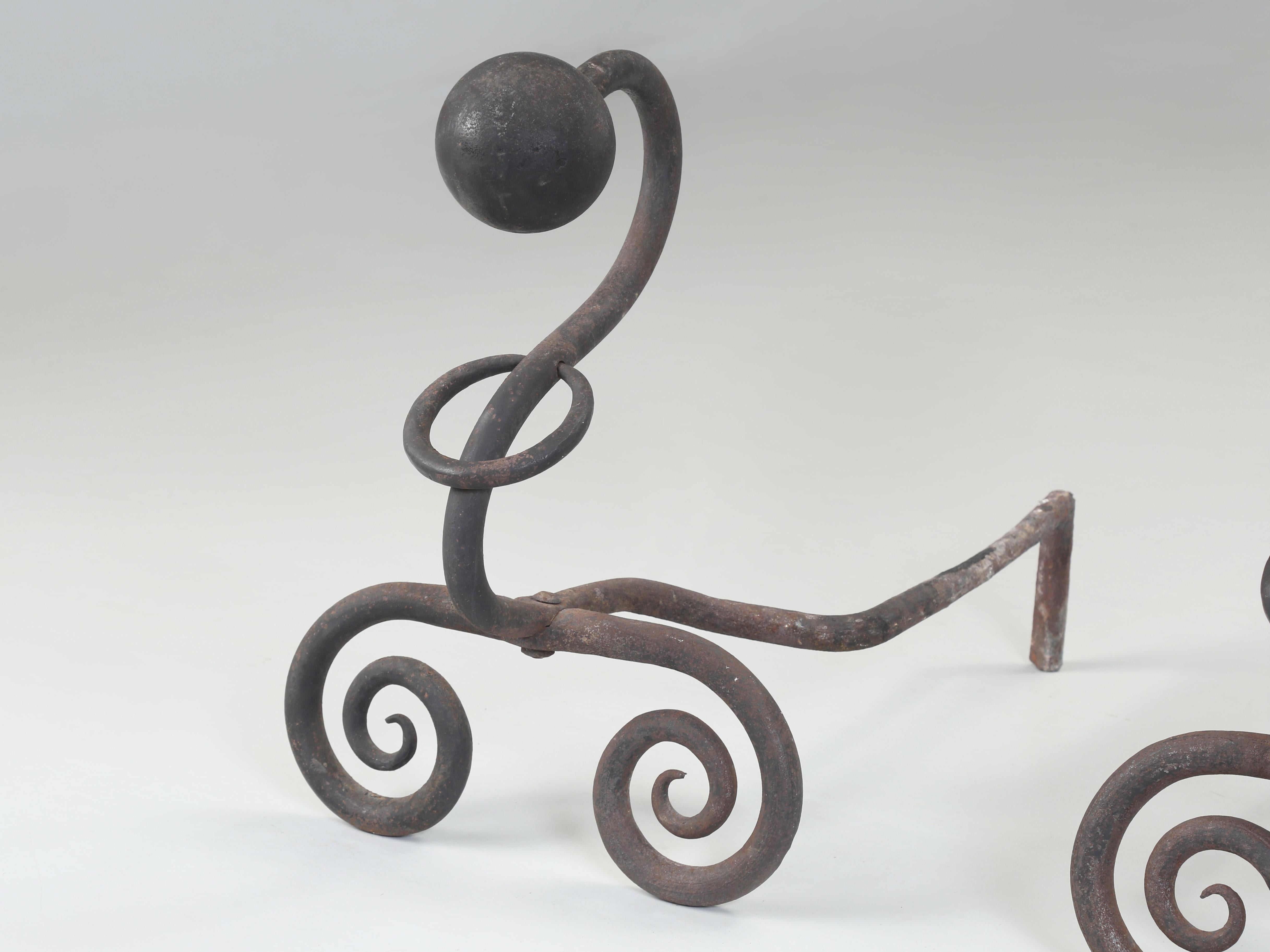 Wrought Iron Fireplace Andirons. Modernist Curled Form with Sphere Top c1940's In Good Condition For Sale In Chicago, IL