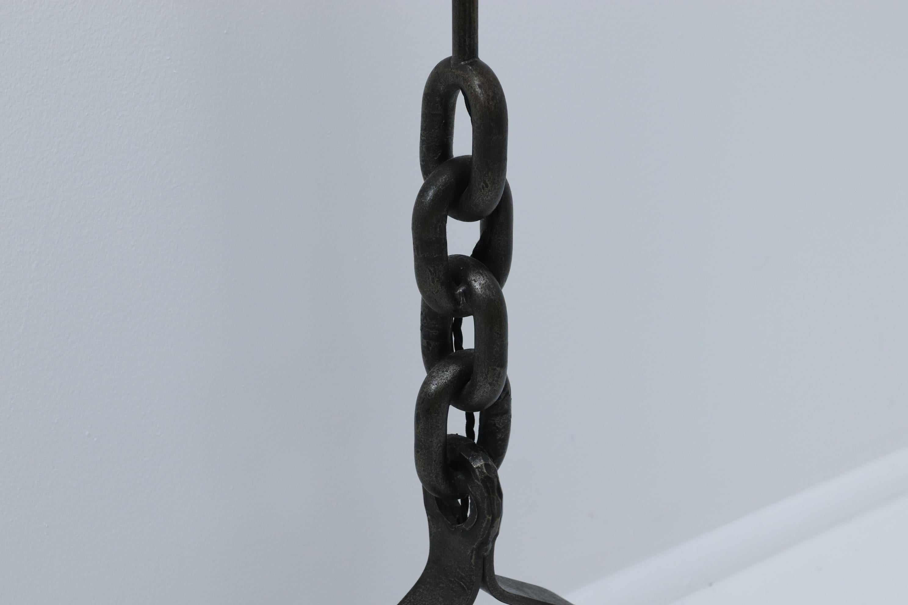 French Wrough Iron Floor Lamp, in the taste of Franz West (1947-2012).

A mid-20th century ironwork 'chain-link' floor lamp. Sold with a bespoke off-white linen cone shade. 

French, c. 1950s. Rewired for the UK & PAT tested.

H147cm (including