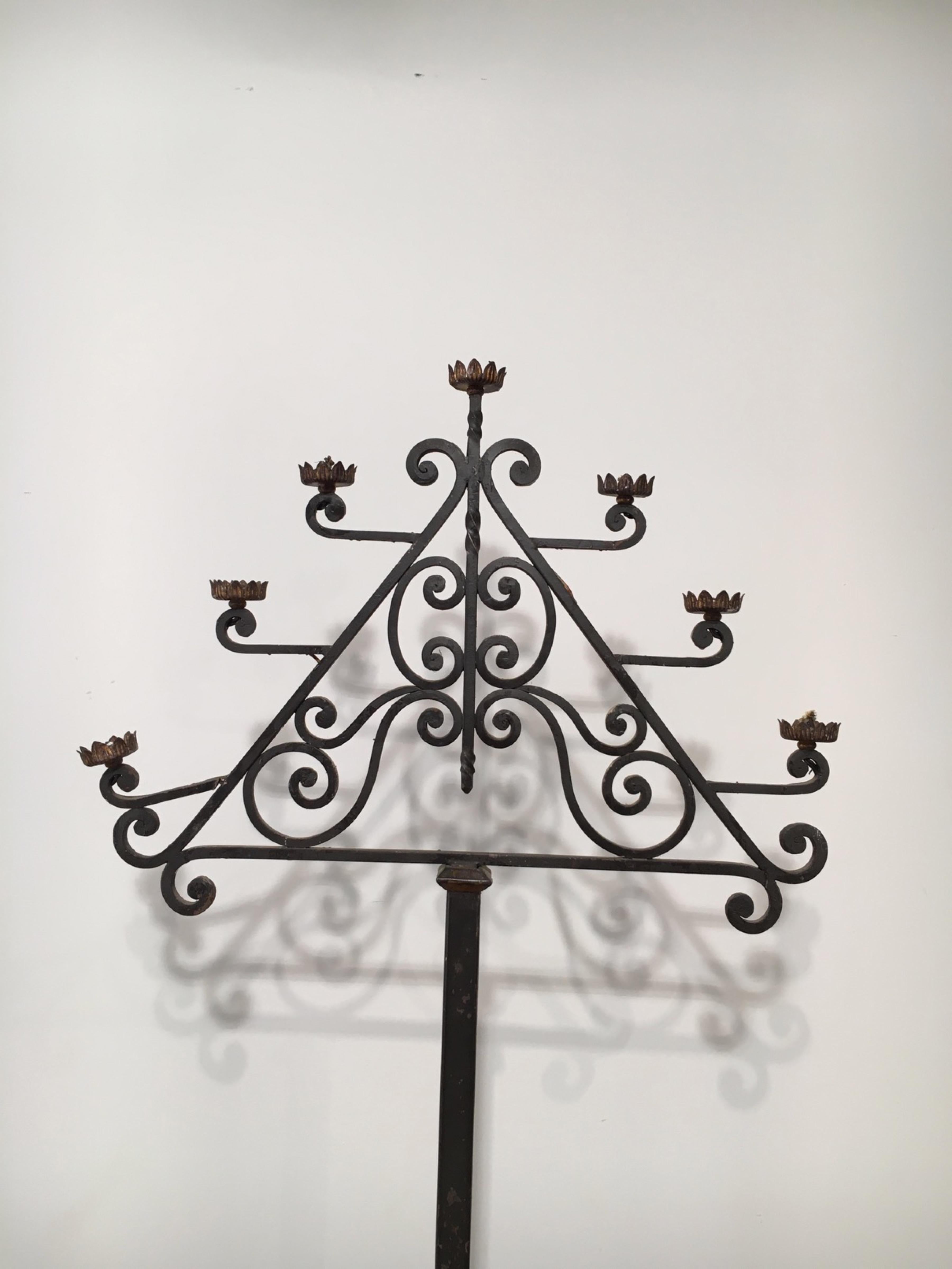 Wrought iron floor lamp with 7 lights. French. Circa 1940.