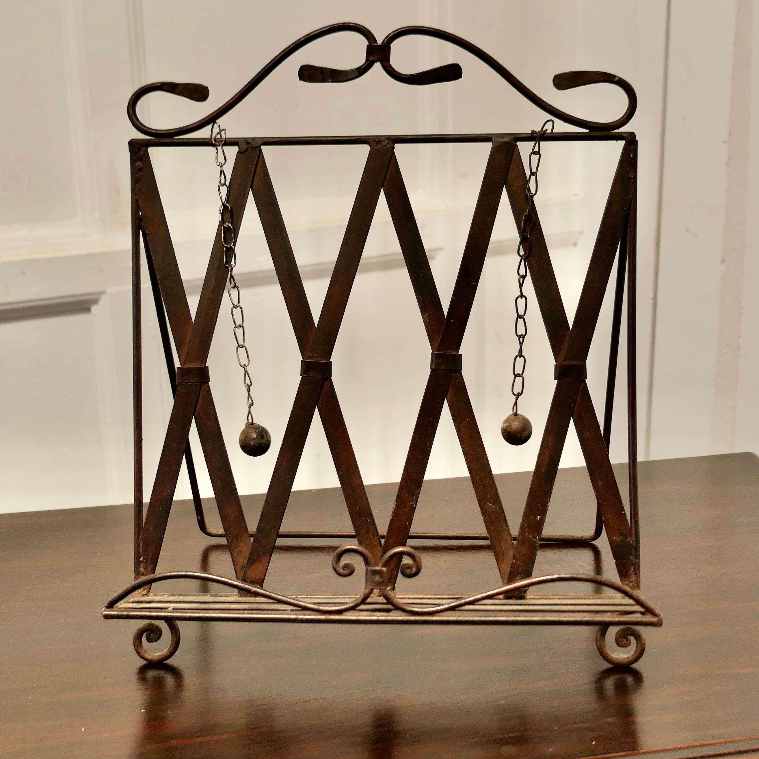 Country Wrought Iron Folding Book Rest, with Page Weights  This is a charming piece  For Sale