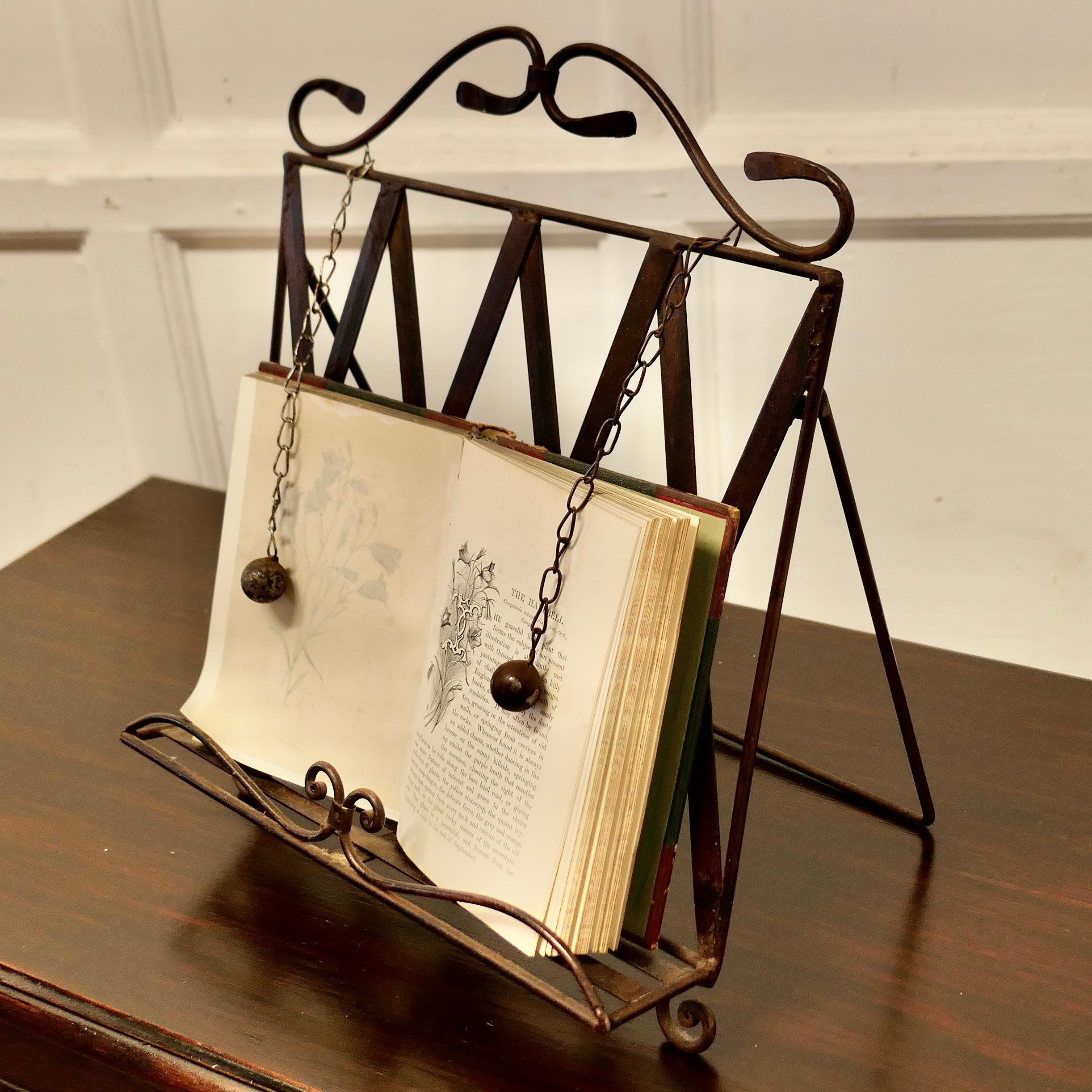 Mid-20th Century Wrought Iron Folding Book Rest, with Page Weights  This is a charming piece  For Sale