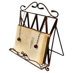 Wrought Iron Folding Book Rest, with Page Weights  This is a charming piece