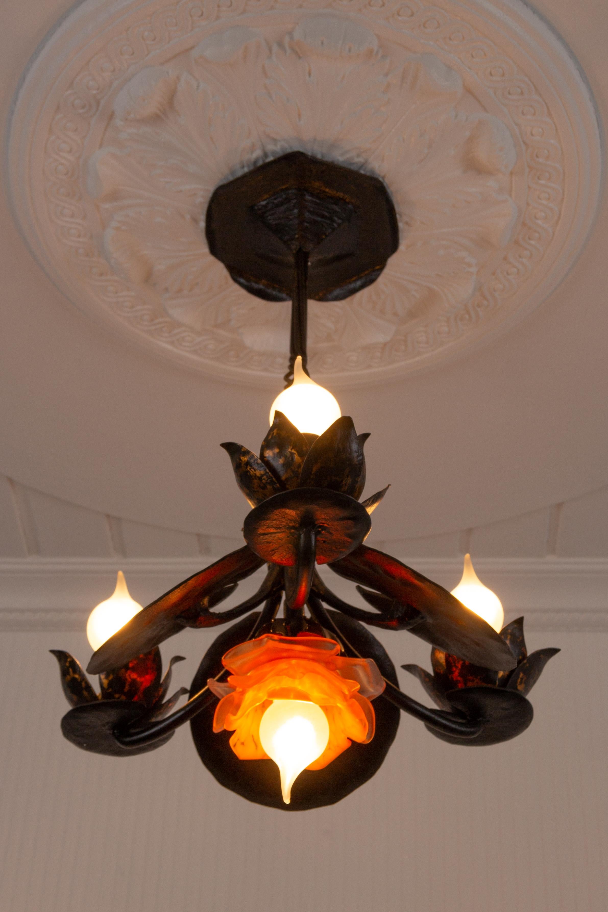 German Wrought Iron Four-Light Water Lily Chandelier with Orange Glass Lampshade For Sale