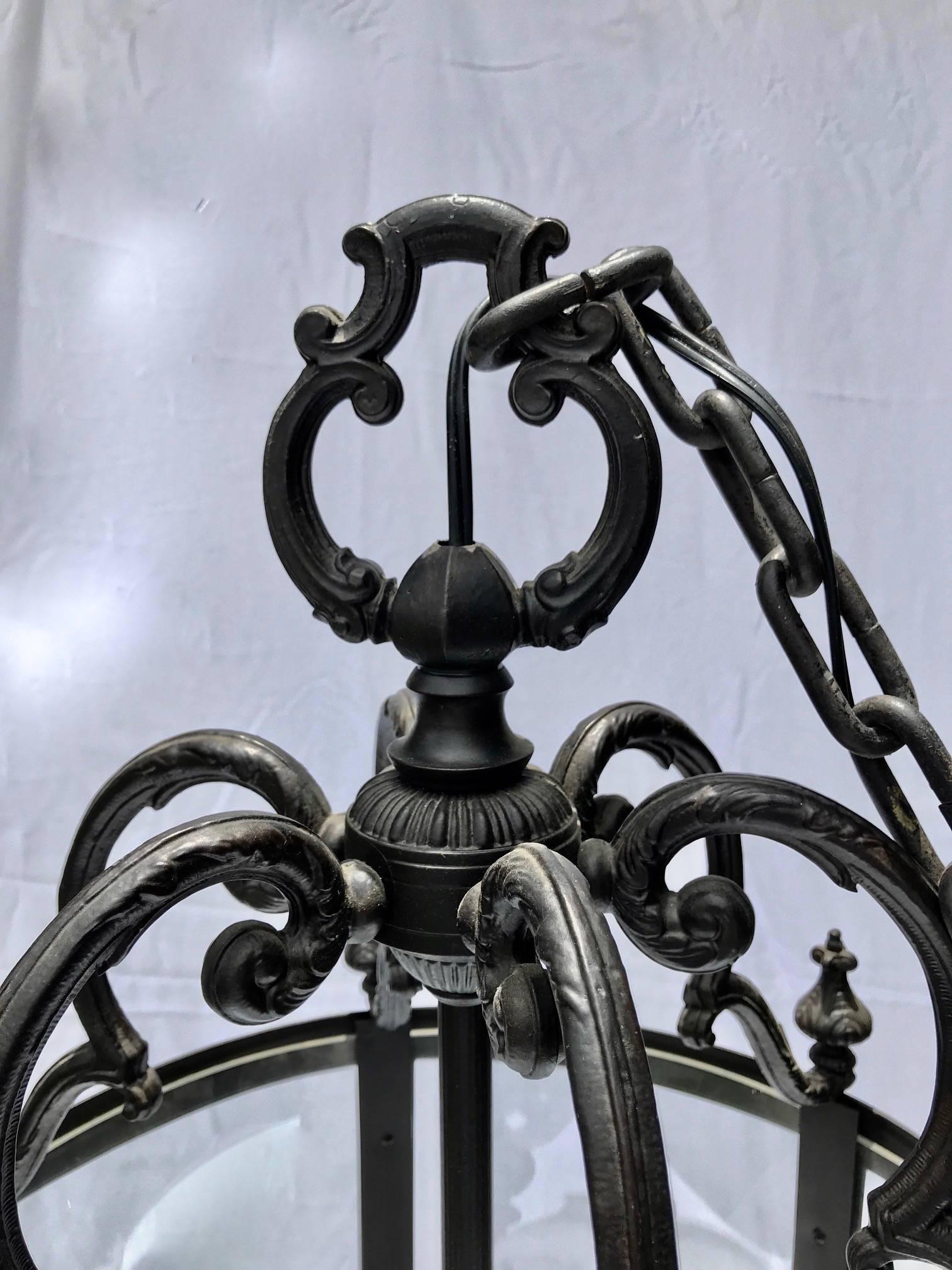 A very large and impressive wrought iron foyer pendant chandelier, made in Spain this elegant, yet sophisticated is a great addition to your large entry or foyer, a very long, 107