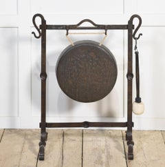 Wrought iron framed dinner gong