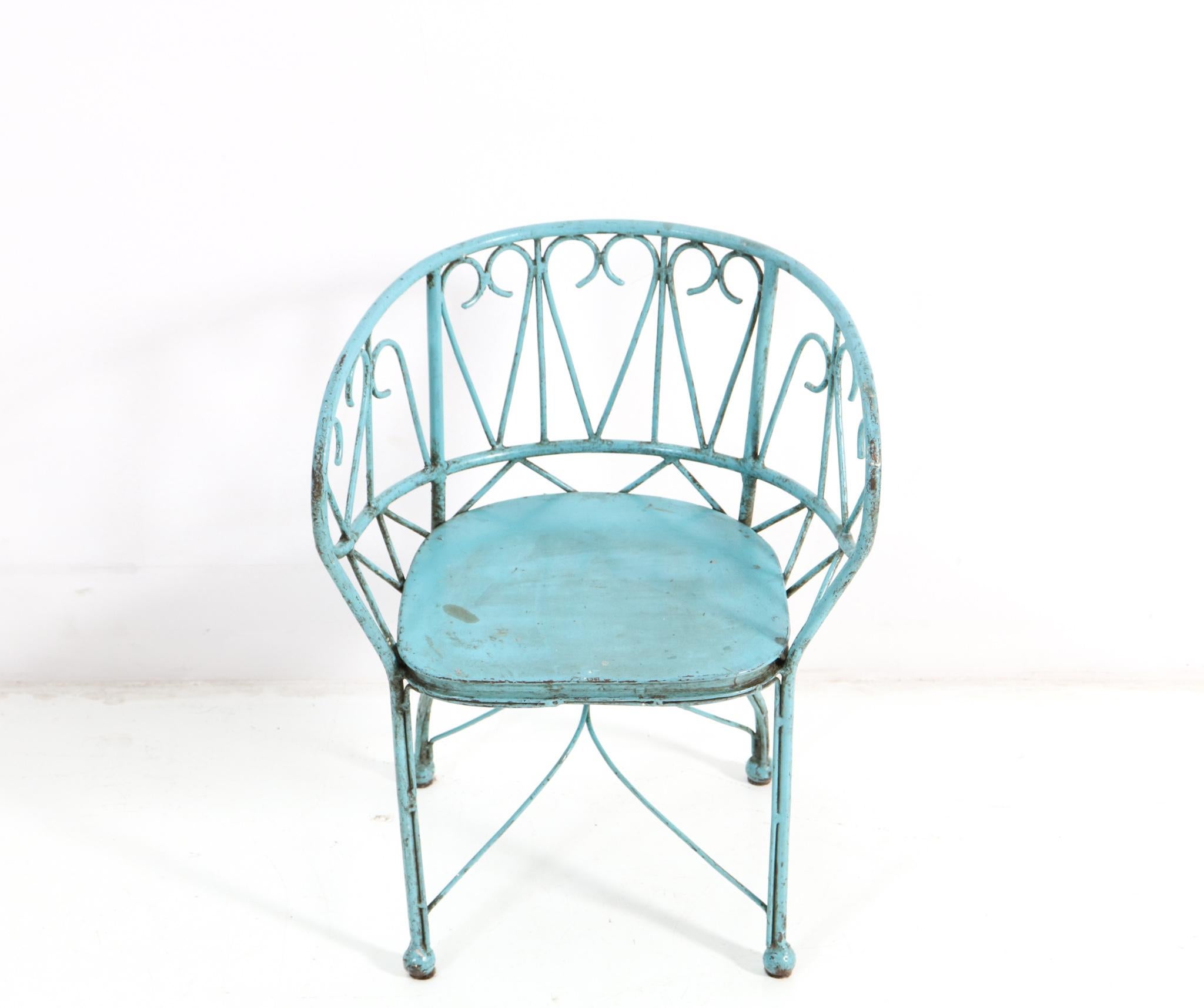 Stunning and rare Art Nouveau children's armchair.
Striking French design from the 1900s.
Blue lacquered wrought iron.
This wonderful Art Nouveau children's armchair is in good condition.
with minor wear consistent with age and use, preserving a