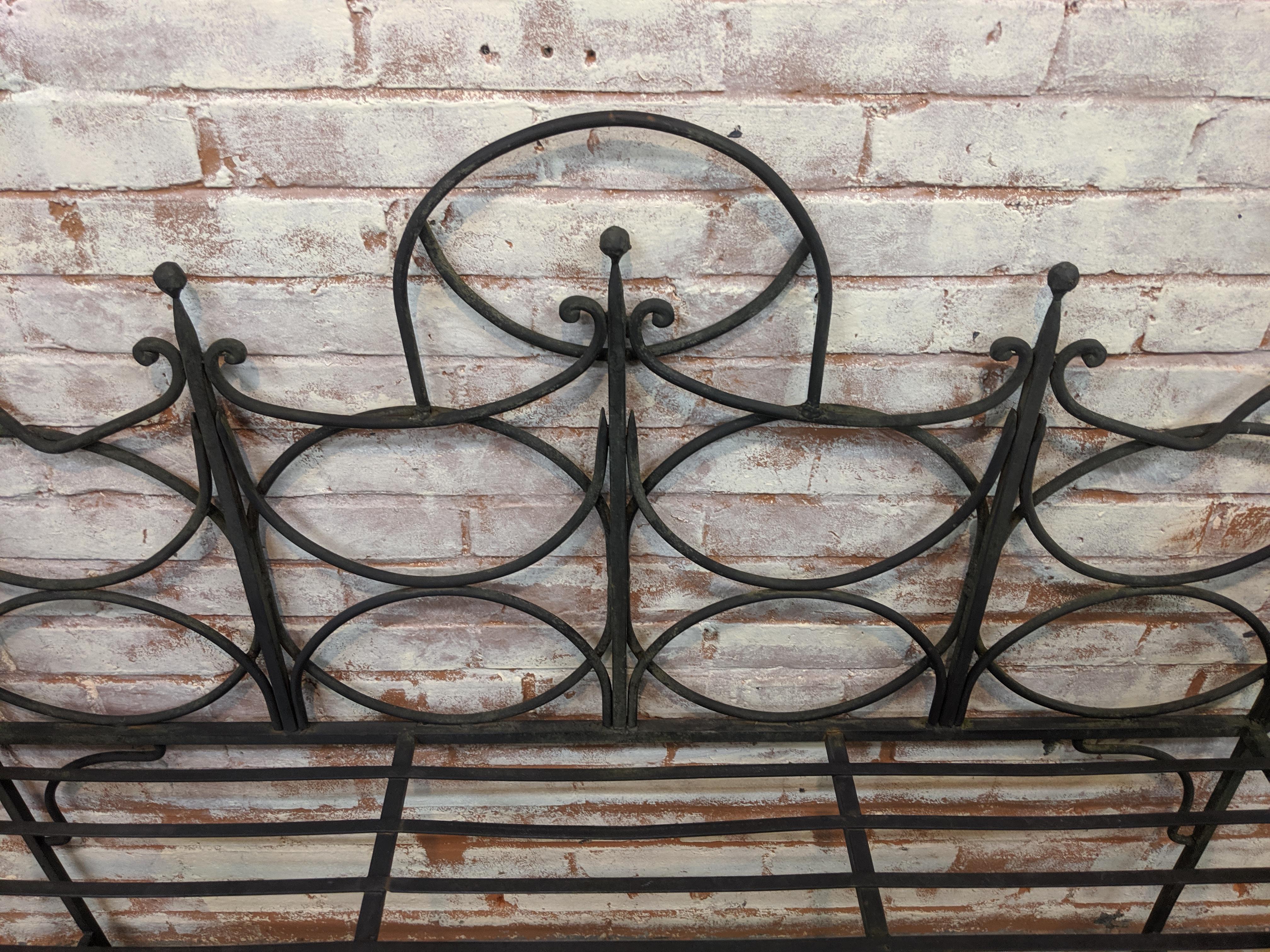 Beautiful vintage wrought iron garden bench. Seat area measures 48