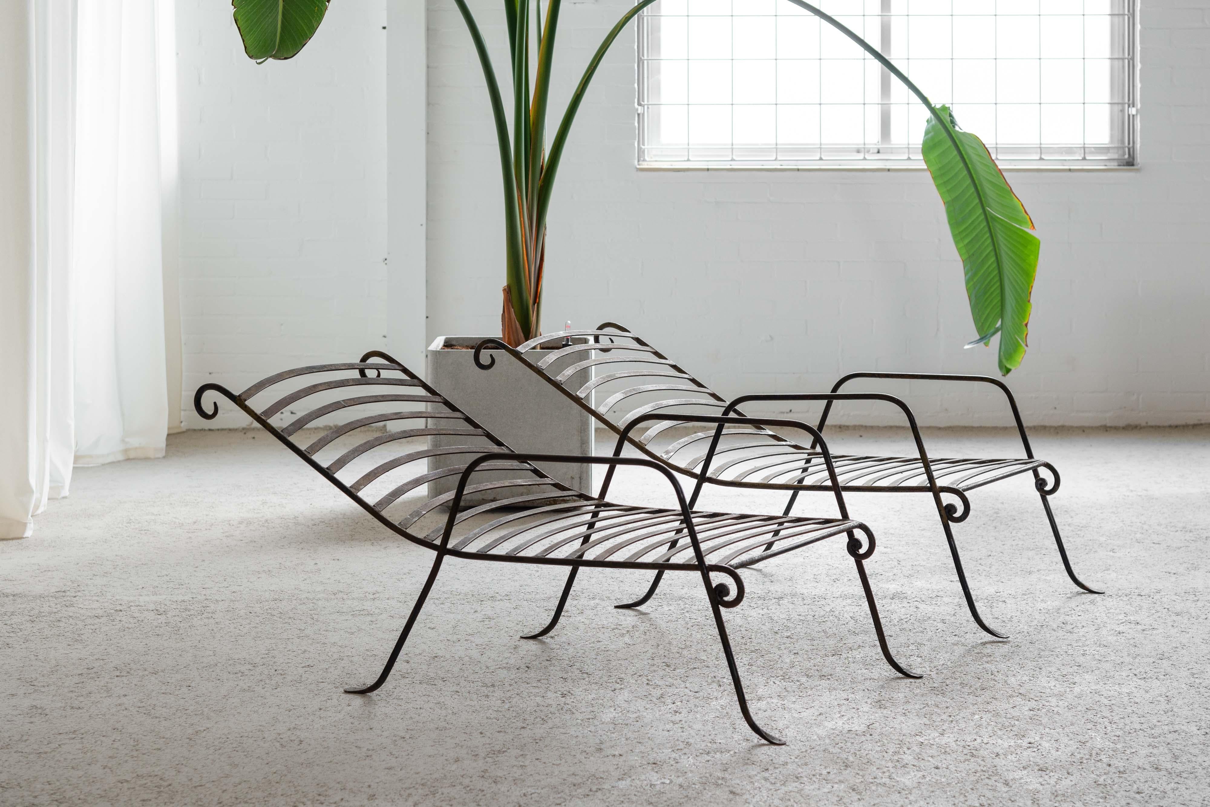 Incredible wrought iron garden lounge chairs made in France 1940. They look like beautiful sculptures. You might even think about famous designers like Rene Drouet, Jean Royere, and Raymond Subes, who worked for Maison Dominique. That's how good