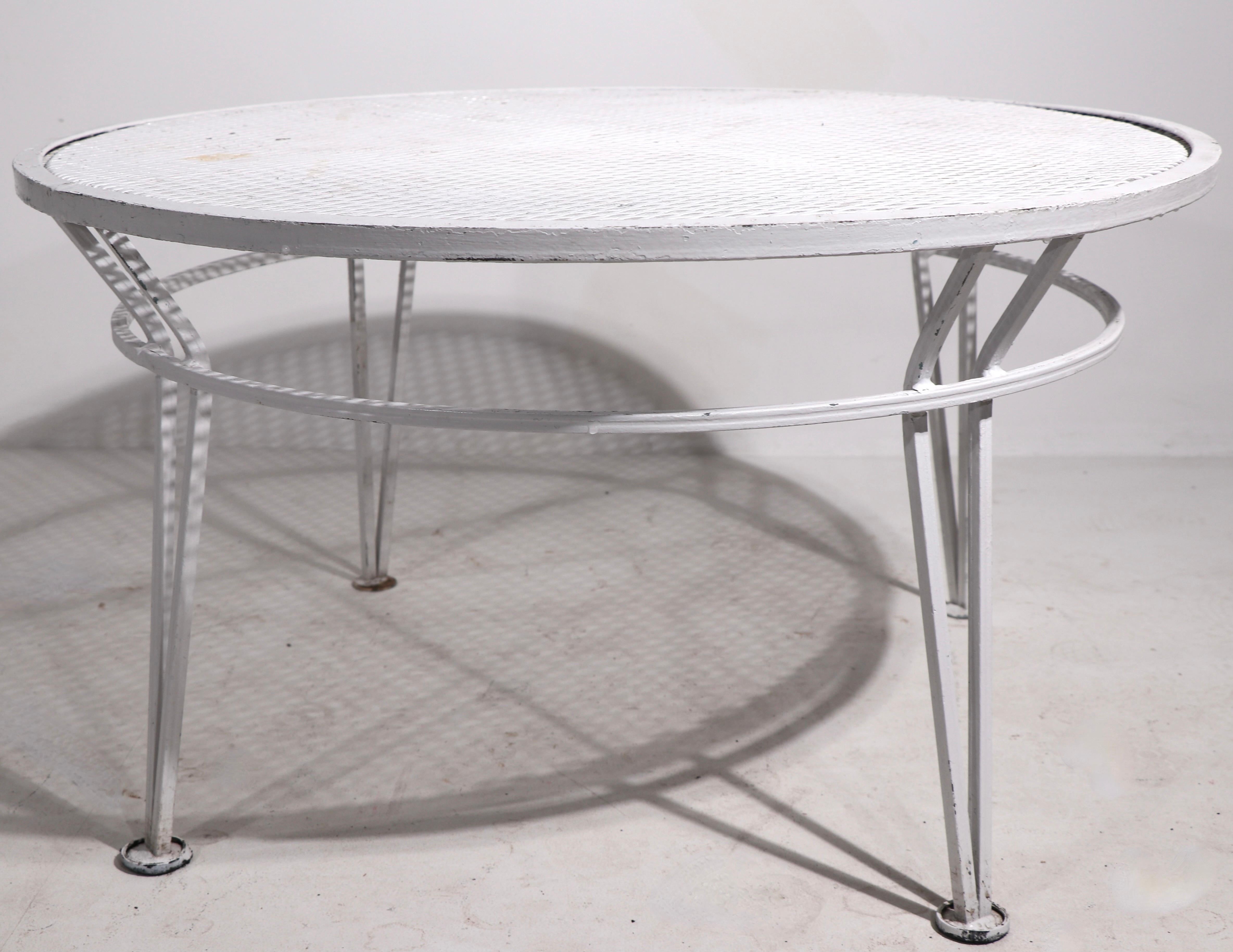 Chic architectural style wrought iron and metal mesh coffee table from the Radar series, by Salterini. This example is in very good condition, it is in newer white paint finish, showing only light cosmetic wear normal and consistent with