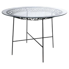 Mesa de comedor Grenada de hierro forjado con tapa de cristal por Umanoff para Shaver Howard Años 60