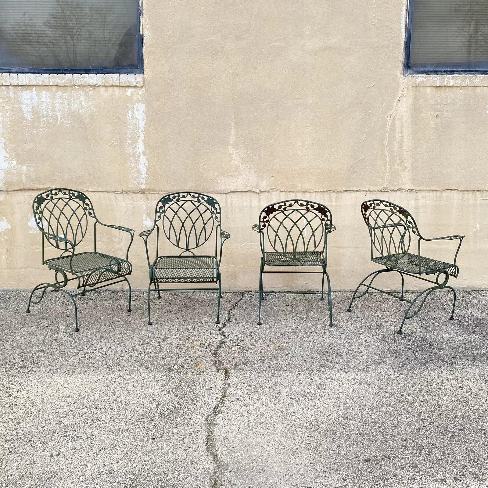 Vintage Wrought Iron Green Victorian Woodard Rose Style Garden Patio Springer Chairs - Set of 4. Circa Late 20th Century. Dimensions : 37