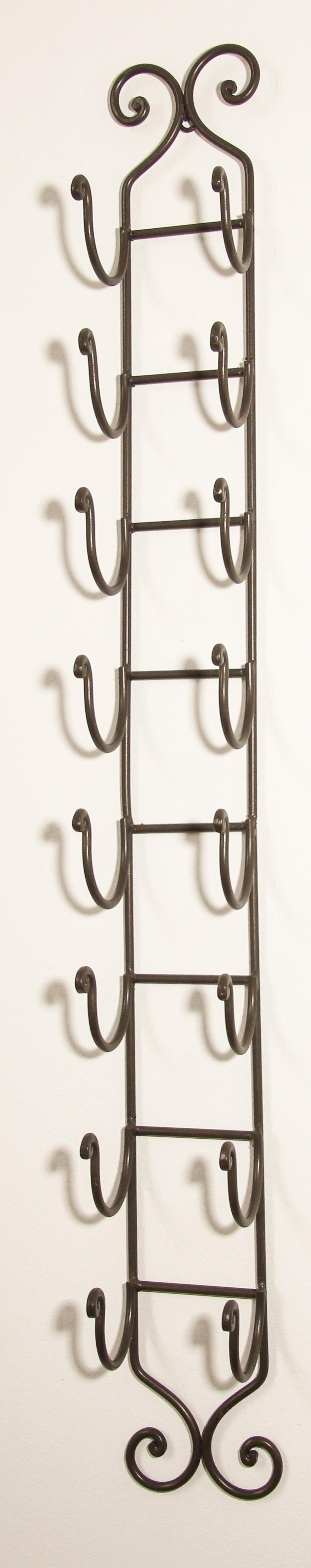 Wrought iron hand forged wall mount wine rack.
Wall mount wine rack in wrought iron finish, the open metal design draws attention to your most coveted wine labels.
Beautiful and functional scrolled wall mount bottle holder.
This handcrafted