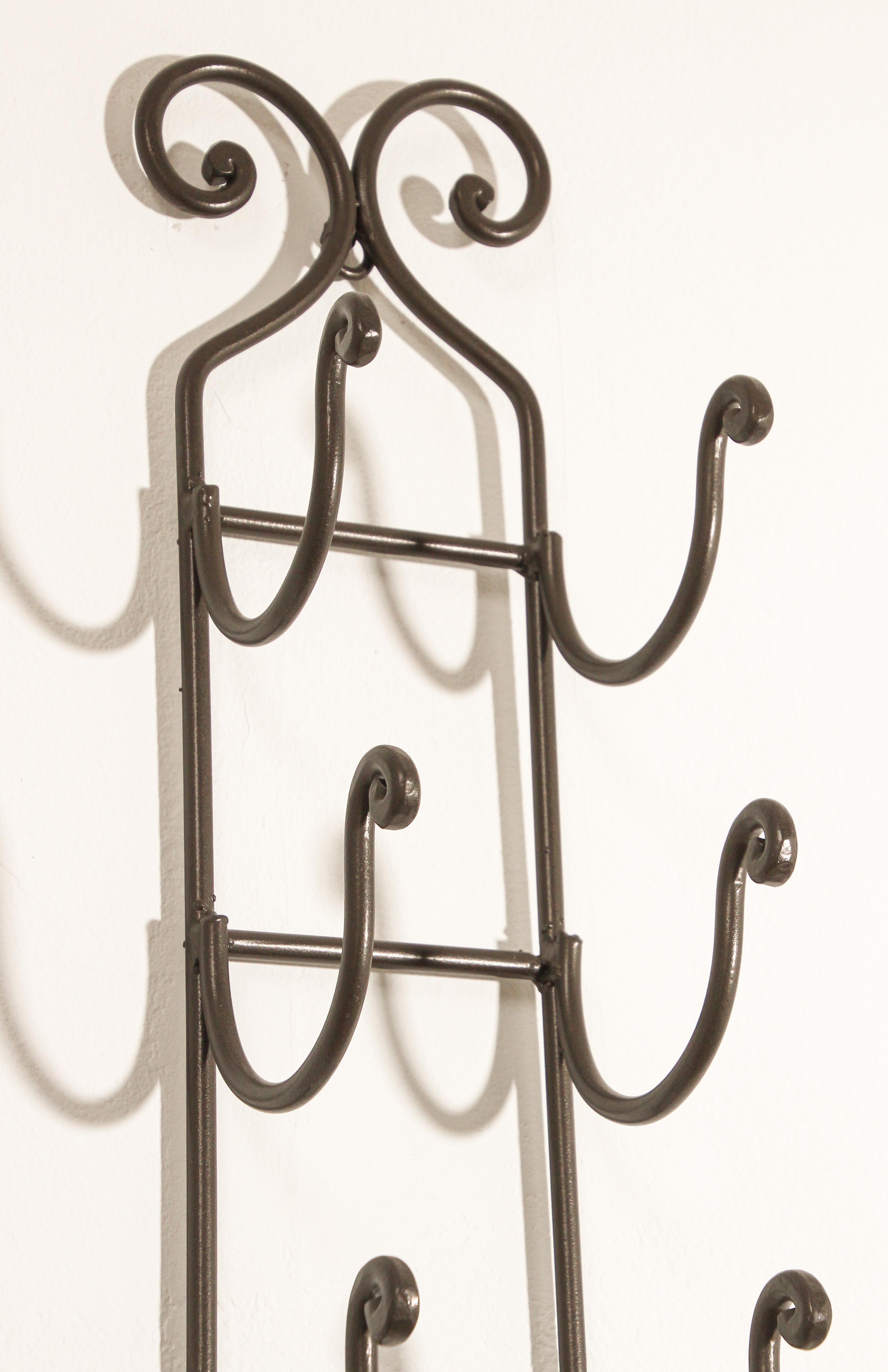 Hand-Crafted Wrought Iron Hand Forged Wall Mount Wine Rack For Sale
