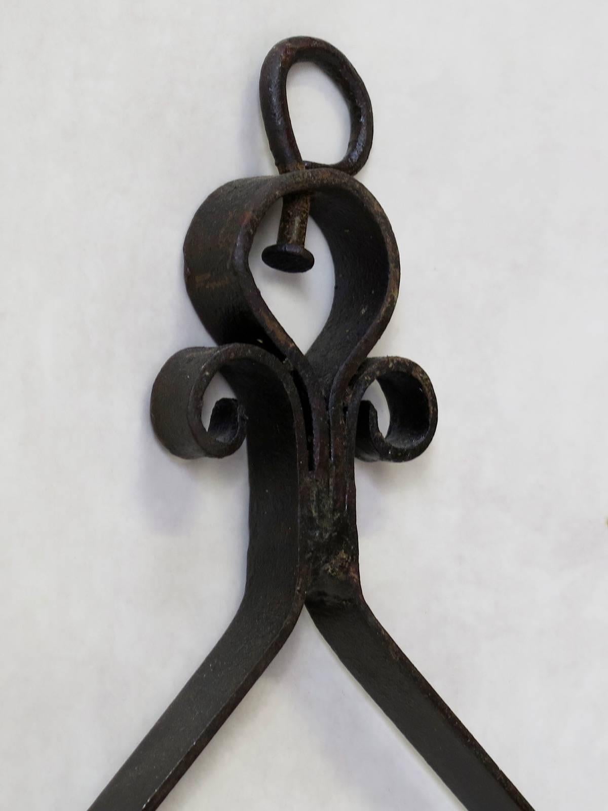 hanging wrought iron candle holder