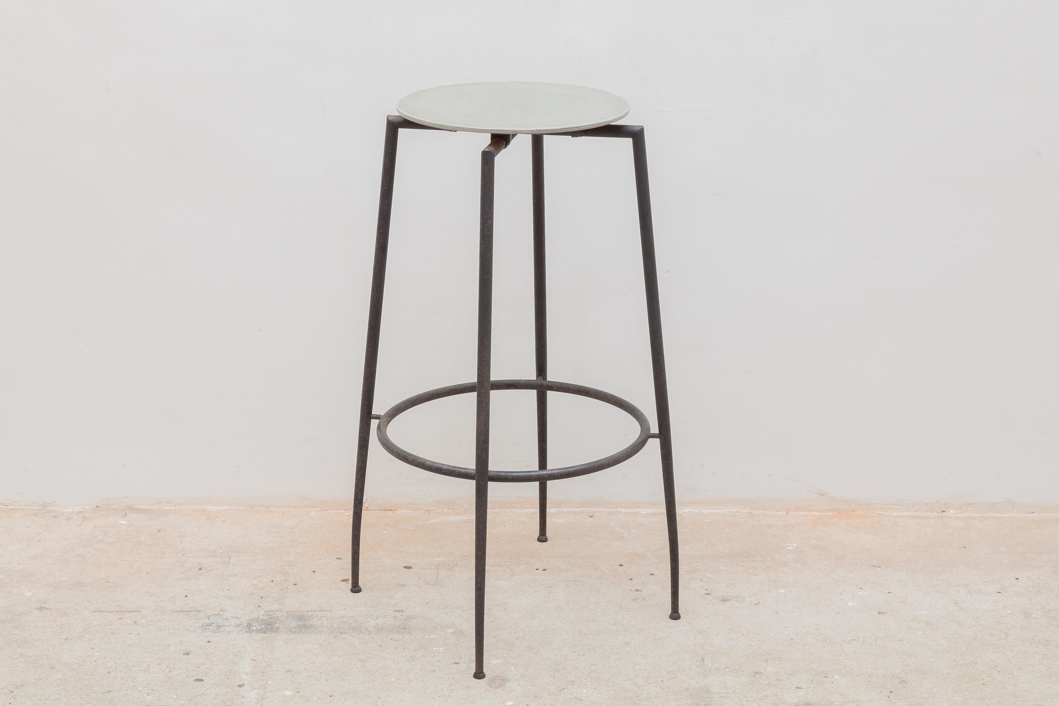 Vintage set of industrial midcentury bar stools Mobelfakta designed by Foraform, Norway, 1980s. Black wrought iron frames with in wood grey painted seats. Vintage patina.

Dimensions: 40 W x 80 H x 40 D cm.