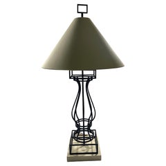 Lampe en fer forgé d'après un modèle de Marc Du Plantier