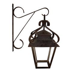 Wrought Iron Lantern Suspended from Wall Bracket, circa 1900