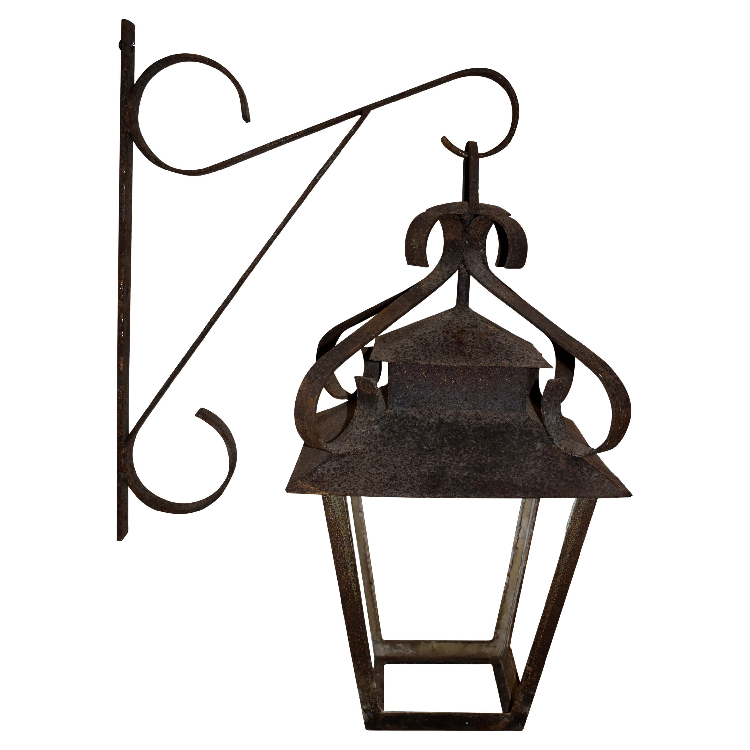 Wrought Iron Lantern Suspended from Wall Bracket, circa 1900 For Sale