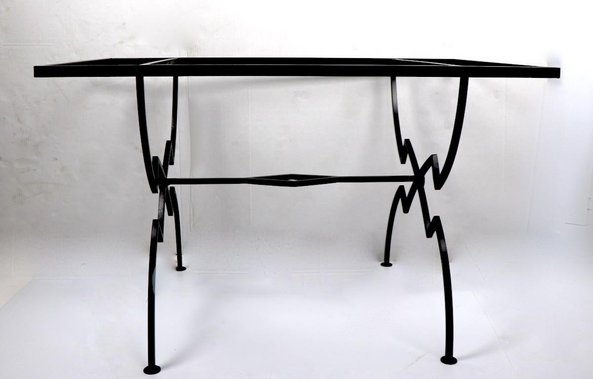 High style wrought iron dining table base, newly powder coated (semi gloss black). We believer it is American in the French style, possibly Salterini. Originally designed for outdoor use, suitable for indoor use as well. Selling without plate glass