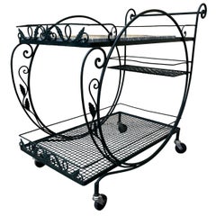 Wrought Iron Marble Top Patio Serving Cart in the Salterini Style. Circa 1960s