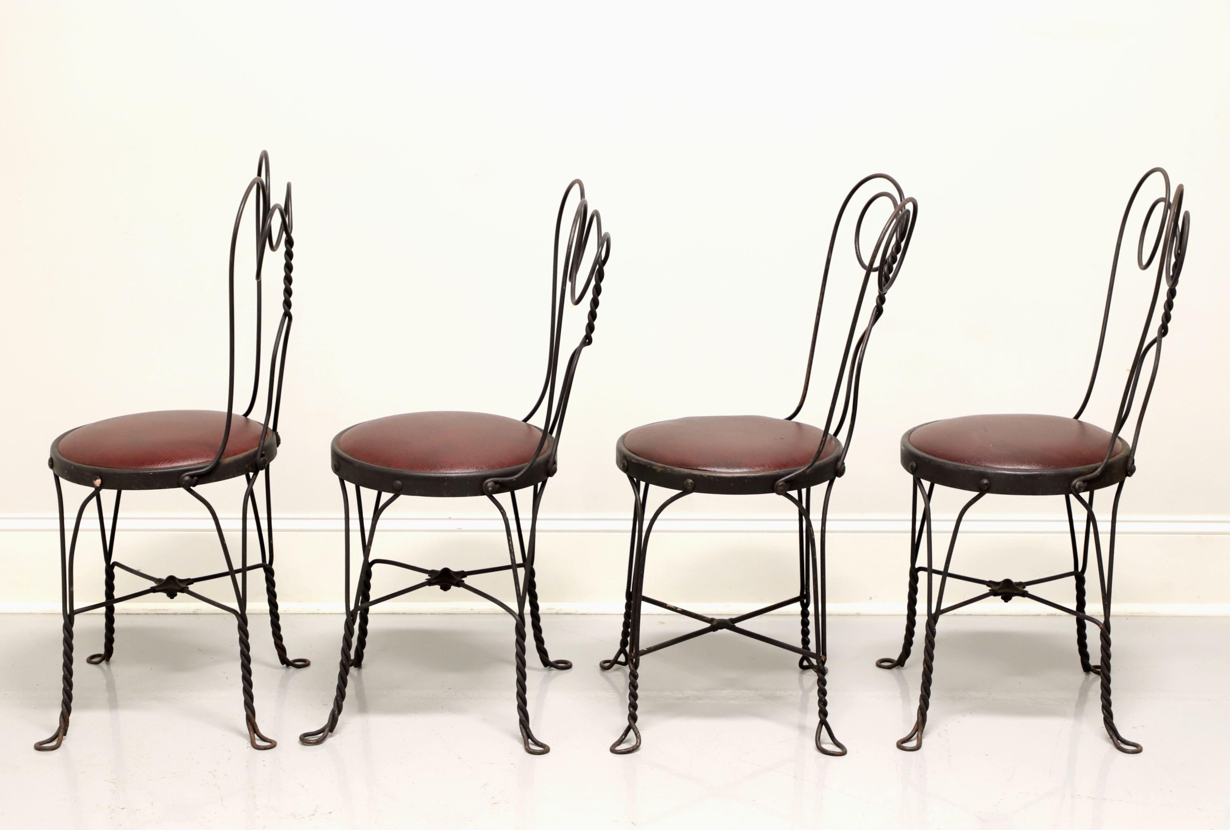 Wrought Iron Mid 20th Century Ice Cream Parlor / Bistro Chairs - Set of 4 In Good Condition In Charlotte, NC