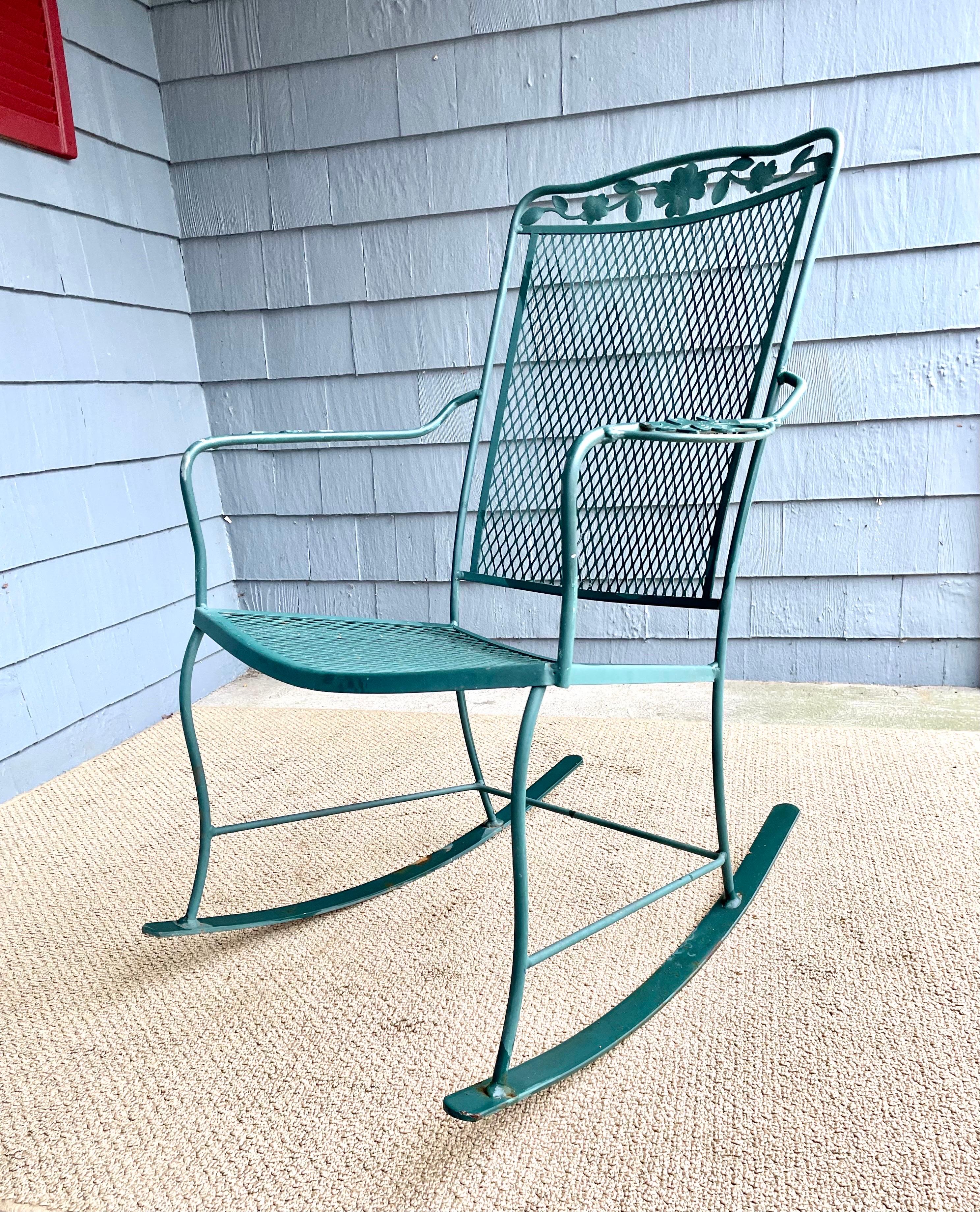 Available now for your enjoyment and ready to ship is a Vintage Wrought Iron Outdoor Patio Rocker Arm Chair

This lovely Wrought Iron Rocker Chair is the perfect addition to any garden, terrace, or veranda. Enjoy a glass of lemonade in the late