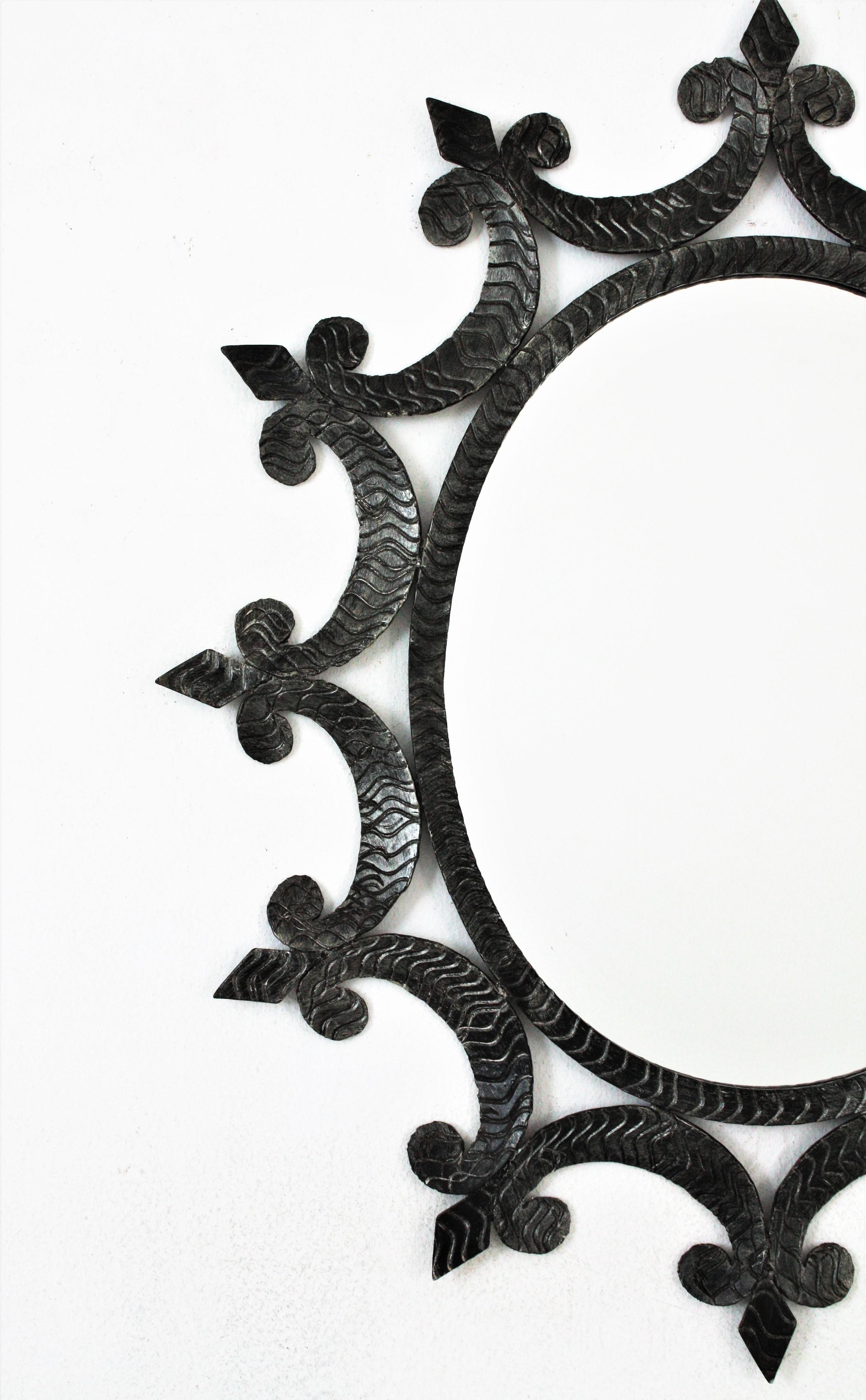 French Sunburst Oval Mirror in Wrought Iron, Brutalist For Sale