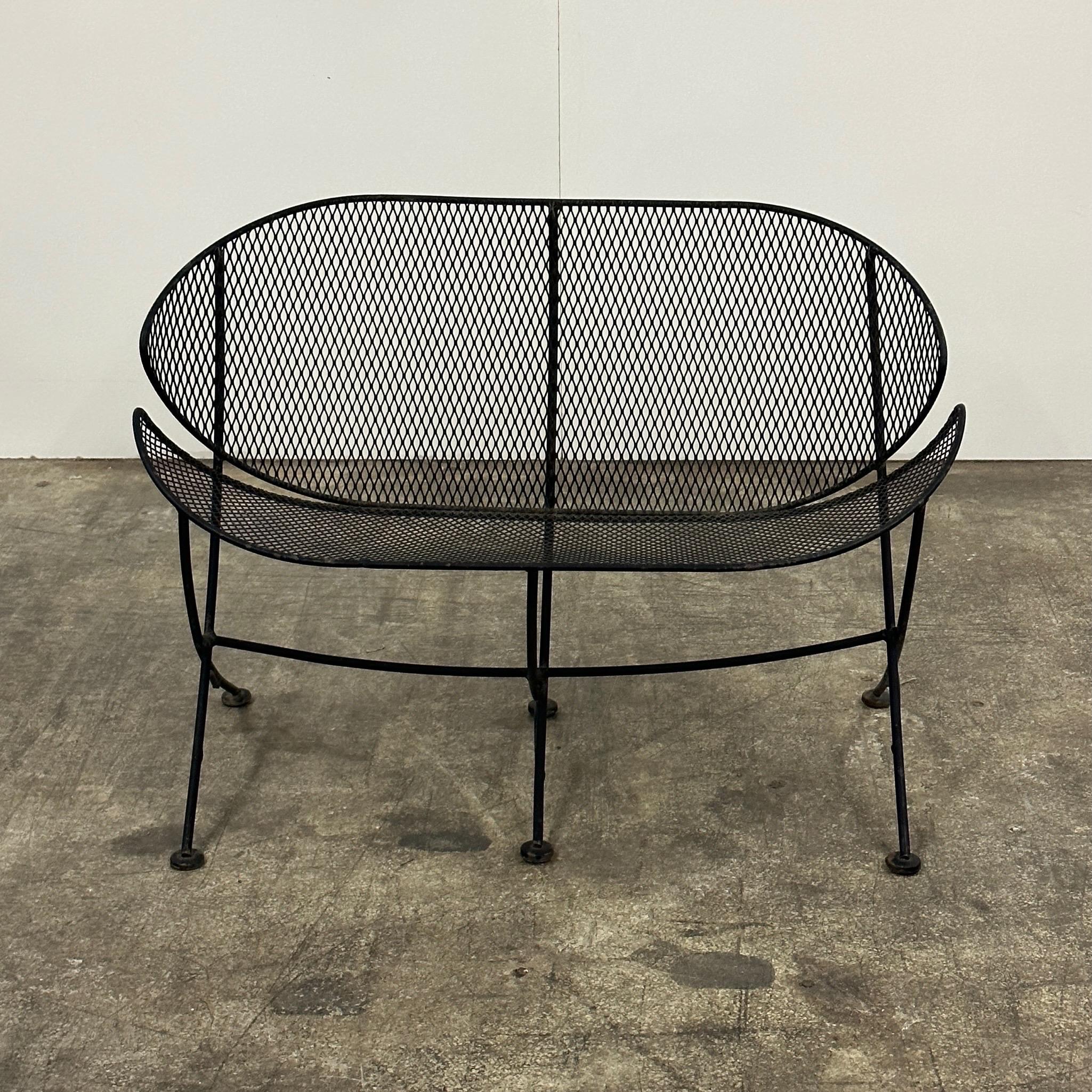 c. 1950s. Price is for the set. Contact us if you’d like to purchase a single item. Pair of chairs plus table and loveseat. All made of wrought iron.

Settee Dim -  25