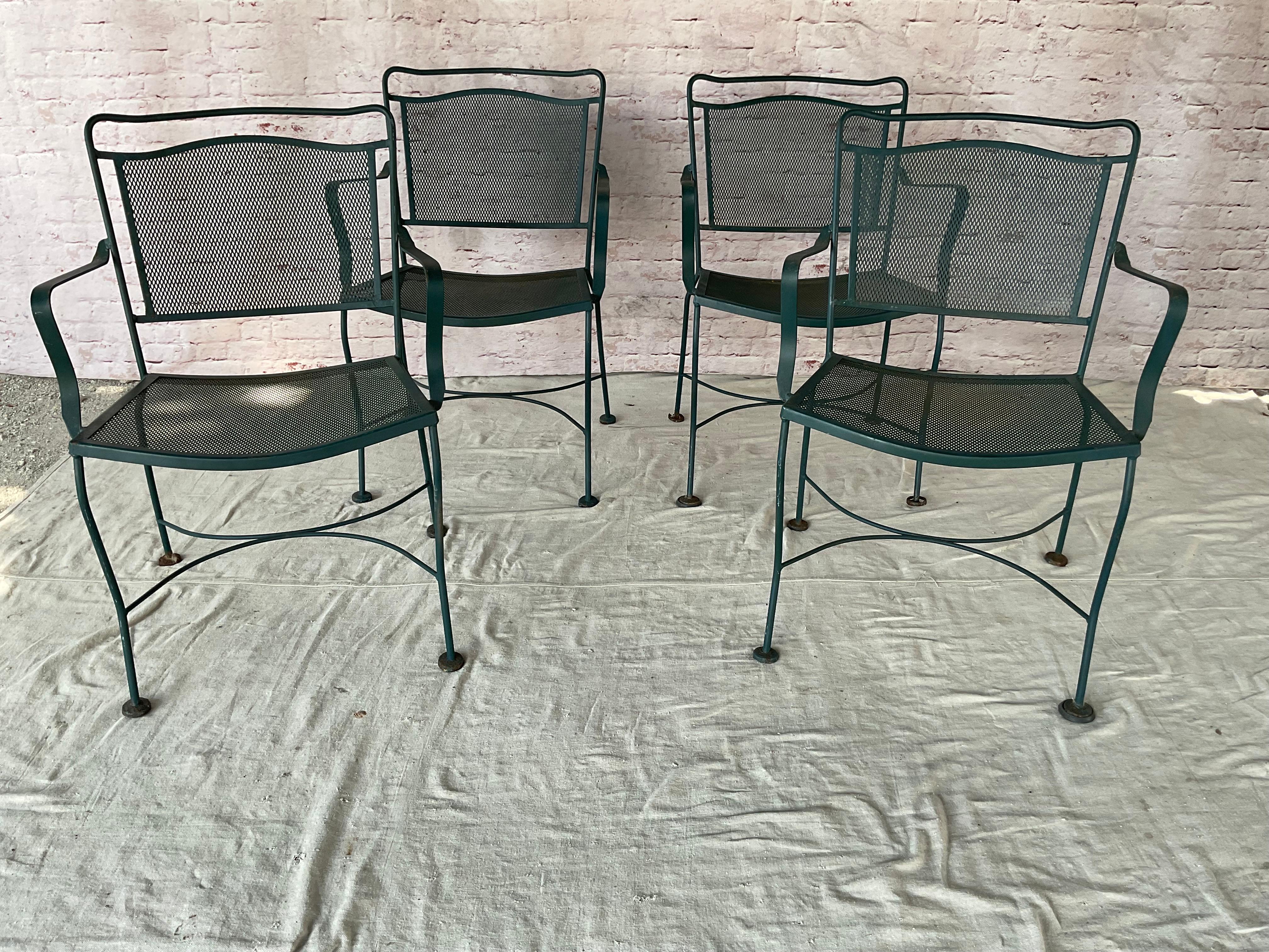 Wrought Iron Patio Table and Four Chairs, A Five Piece Set For Sale 4