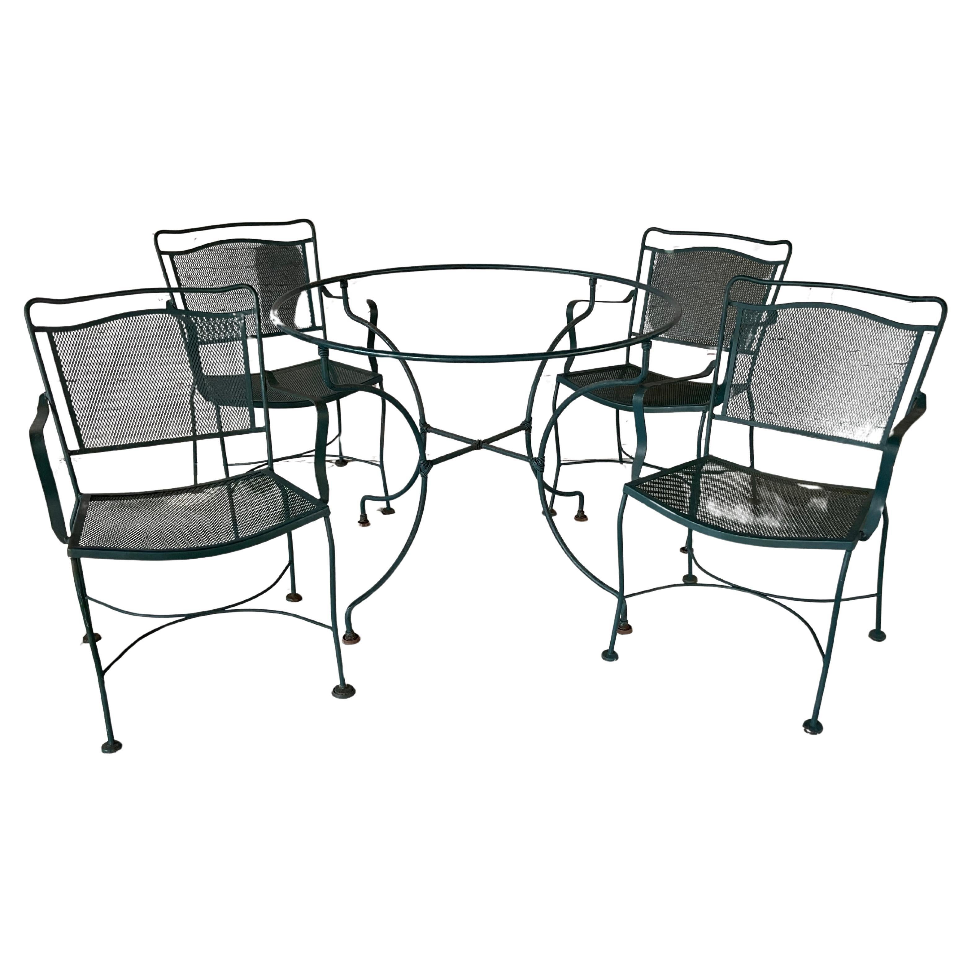 Wrought Iron Patio Table and Four Chairs, A Five Piece Set For Sale 1