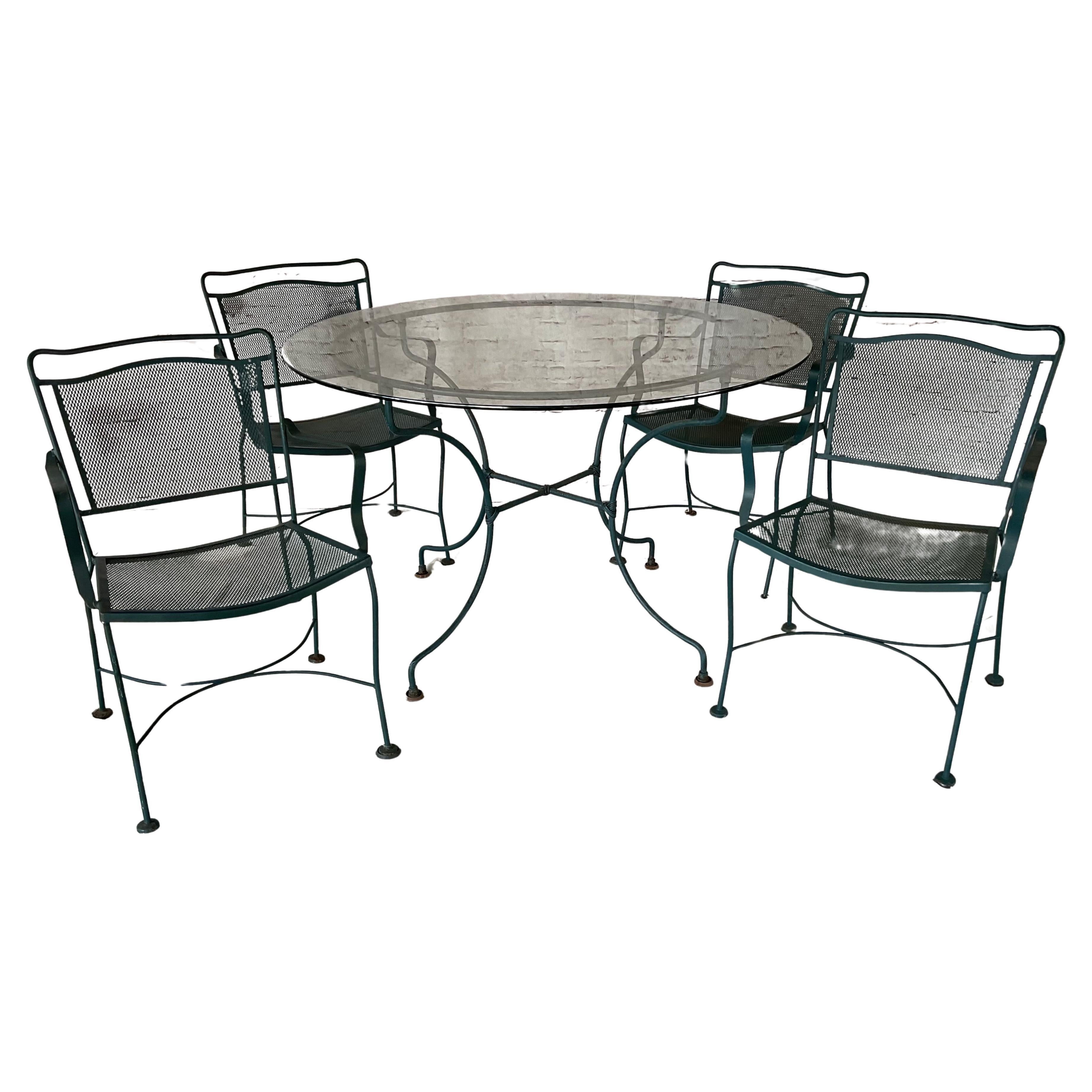 Wrought Iron Patio Table and Four Chairs, A Five Piece Set