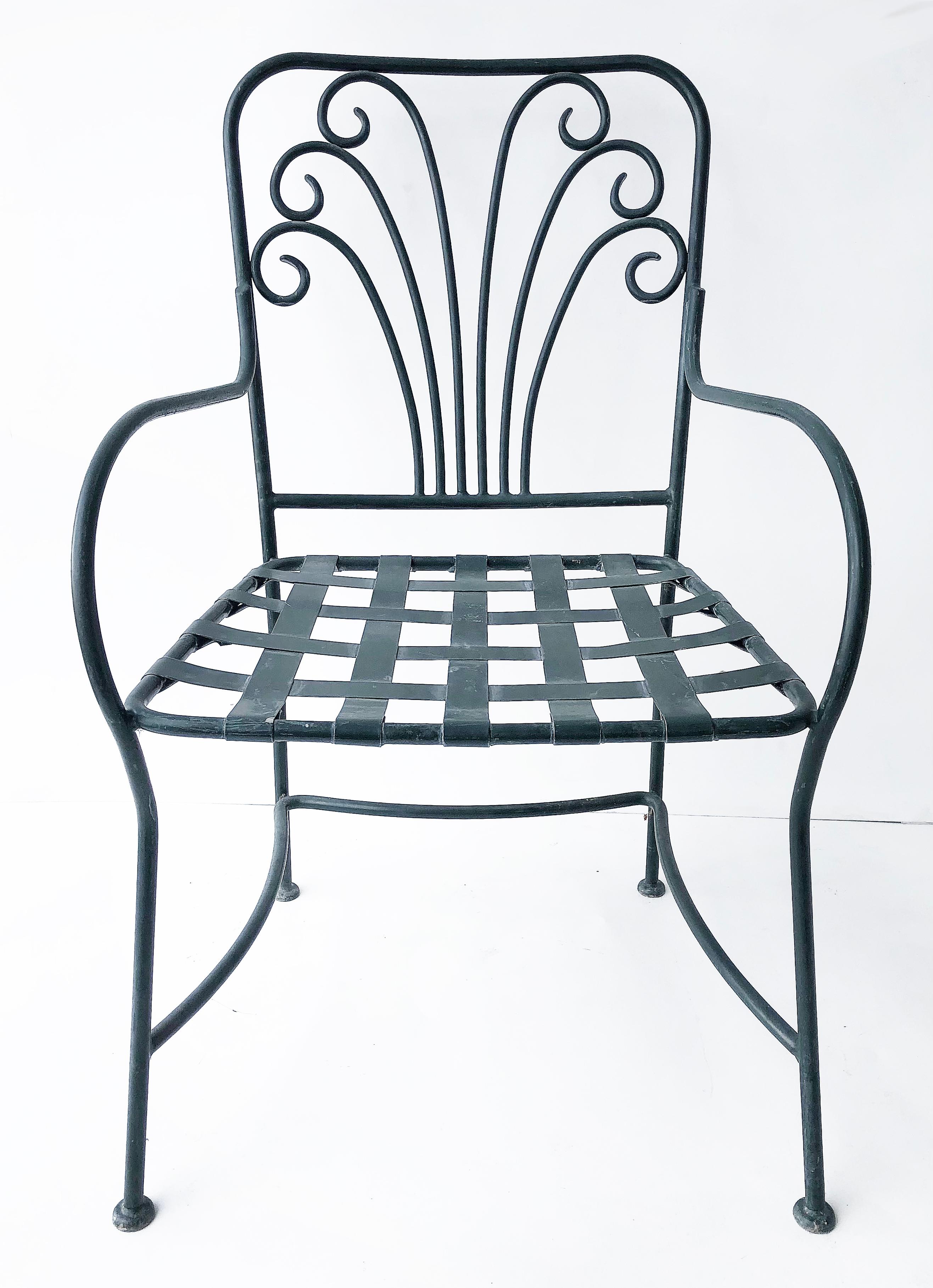 Set of eight powder-coated garden/patio dining chairs

Offered for sale is a set of eight powder-coated garden patio chairs with scrollwork and woven metal seats. The chairs are nicely finished however, some of the paint on the slats of the seats