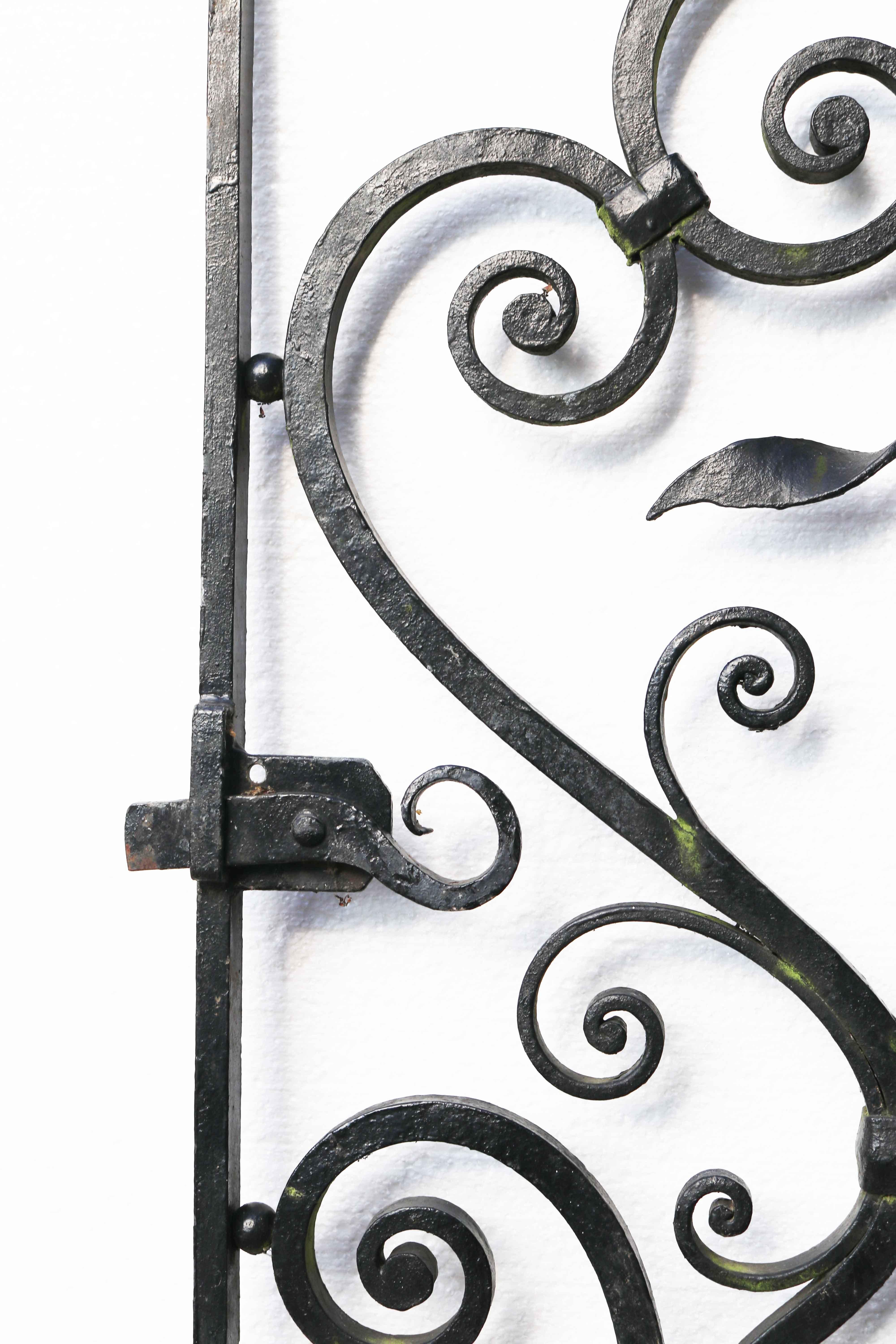 A good quality reclaimed wrought iron garden gate. Blacksmith made. This is one of three similar gates reclaimed from a property in Oxfordshire.