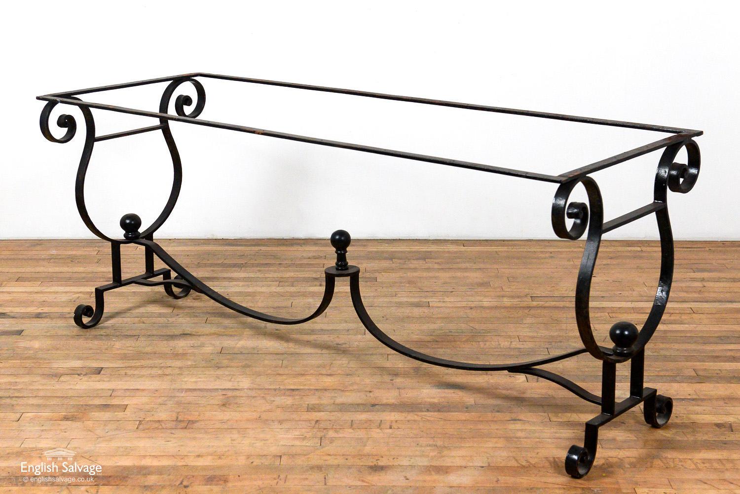 Wrought iron table base with an elegant scroll and ball design. This rectangular table base is newly made and in good condition.