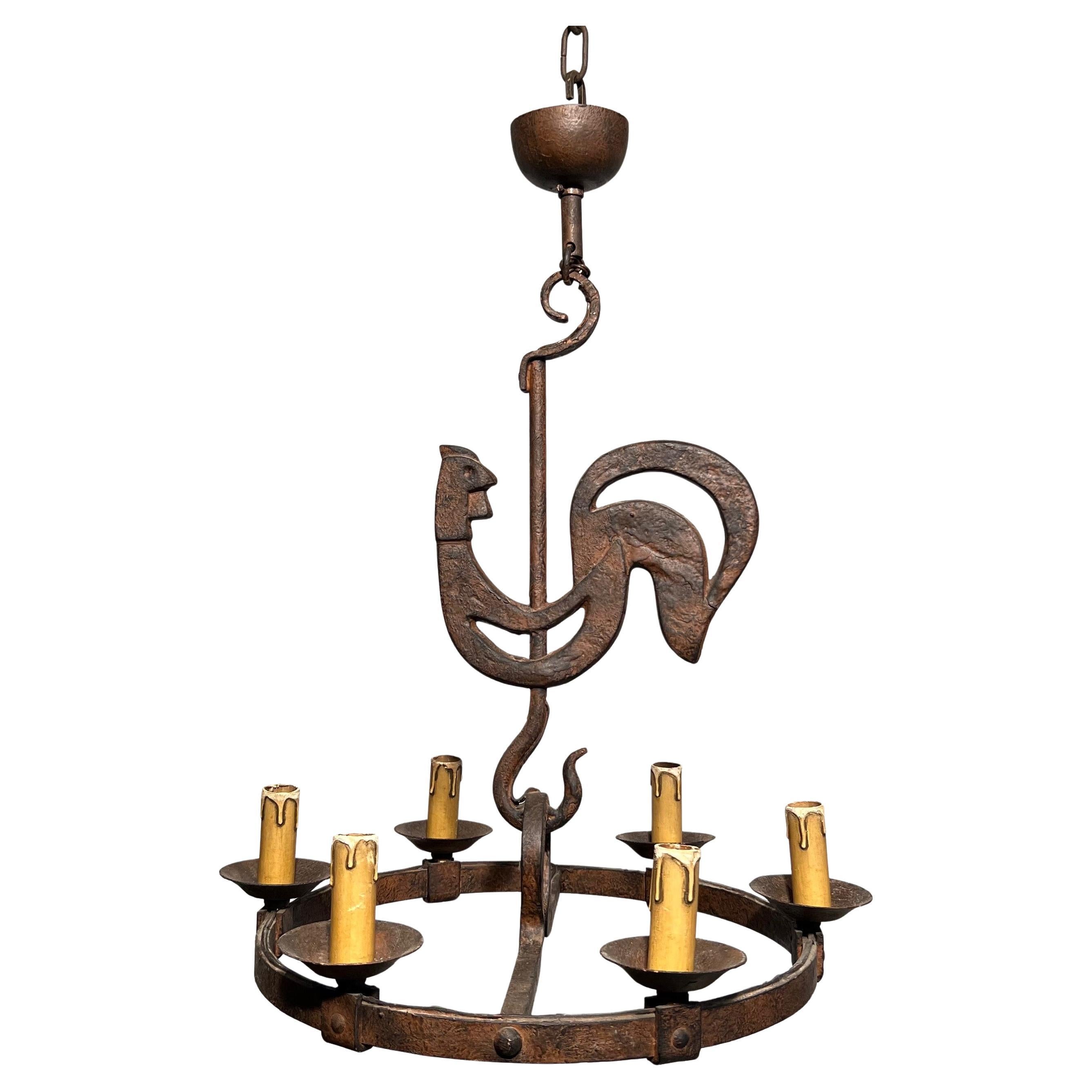 Lustre coq en fer forgé de jean Touret pour l
Atelier Marolles