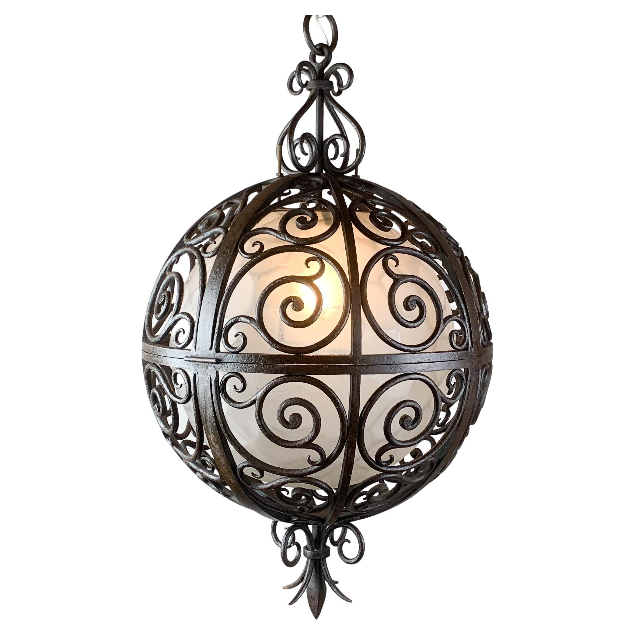 Wrought Iron Round Suspension with Interior Glass Sphere, C.1930 For Sale