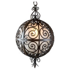 Wrought Iron Round Suspension with Interior Glass Sphere, C.1930
