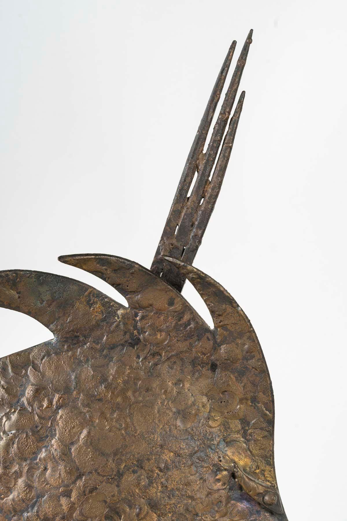Wrought iron sculpture of a fish, Art Deco period, circa 1930.

Wrought iron sculpture of a fish from the Art Deco period, circa 1930, contemporary stand.
H: 64cm, W: 43cm, D: 5cm